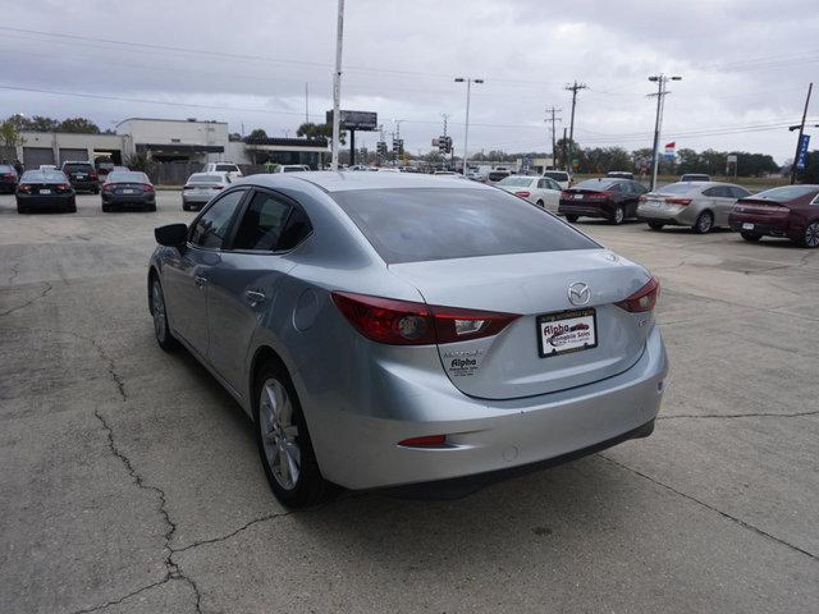 2017 Silver Mazda Mazda3 (3MZBN1V75HM) with an 2.0L 4Cyl engine, Automatic transmission, located at 6904 Johnston St., Lafayette, LA, 70503, (337) 988-1960, 30.143589, -92.100601 - Prices are subject to change as improvements done by the service dept. Prices are for Cash sales only, Plus TTL. This Vehicle is Serviced well and Warranties Available too. Easy Financing. Drives Great and everything works. Price subject to change as improvements done by the service dept. Easy CR - Photo #7