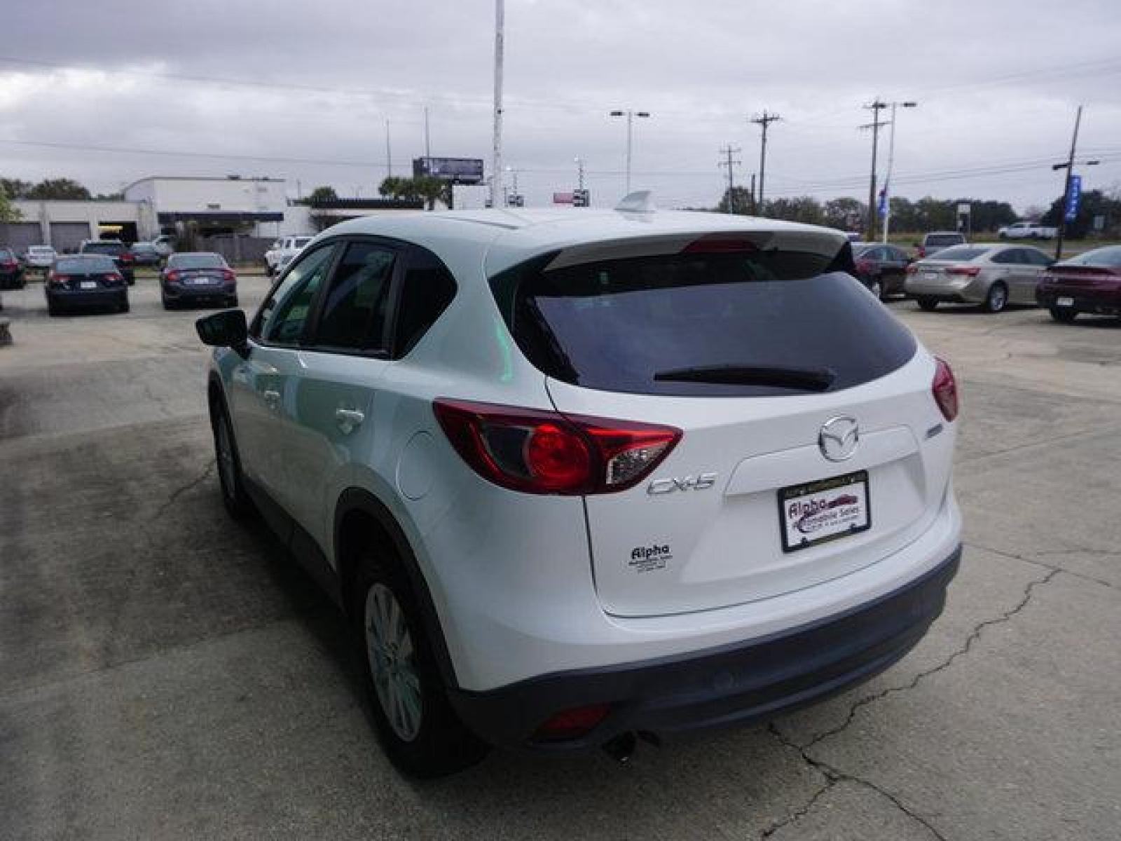 2014 White Mazda CX-5 (JM3KE2CY5E0) with an 2.5L 4Cyl engine, Automatic transmission, located at 6904 Johnston St., Lafayette, LA, 70503, (337) 988-1960, 30.143589, -92.100601 - Prices are subject to change as improvements done by the service dept. Prices are for Cash sales only, Plus TTL. This Vehicle is Serviced well and Warranties Available too. Easy Financing. Drives Great and everything works. Price subject to change as improvements done by the service dept. Easy CR - Photo #7
