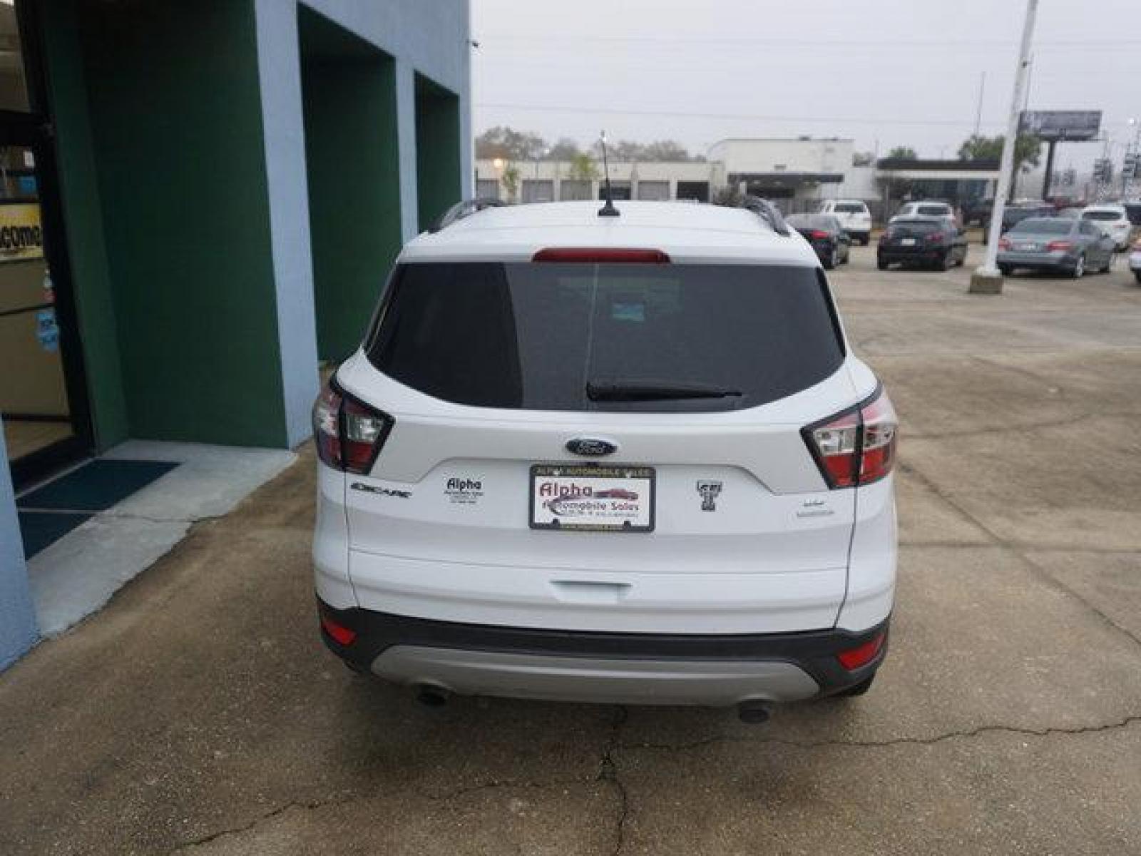2018 White Ford Escape (1FMCU0GD4JU) with an 1.5L I4 EcoBoost engine, Automatic transmission, located at 6904 Johnston St., Lafayette, LA, 70503, (337) 988-1960, 30.143589, -92.100601 - Prices are subject to change as improvements done by the service dept. Prices are for Cash sales only, Plus TTL. This Vehicle is Serviced well and Warranties Available too. Easy Financing. Drives Great and everything works. Price subject to change as improvements done by the service dept. Easy CR - Photo #9