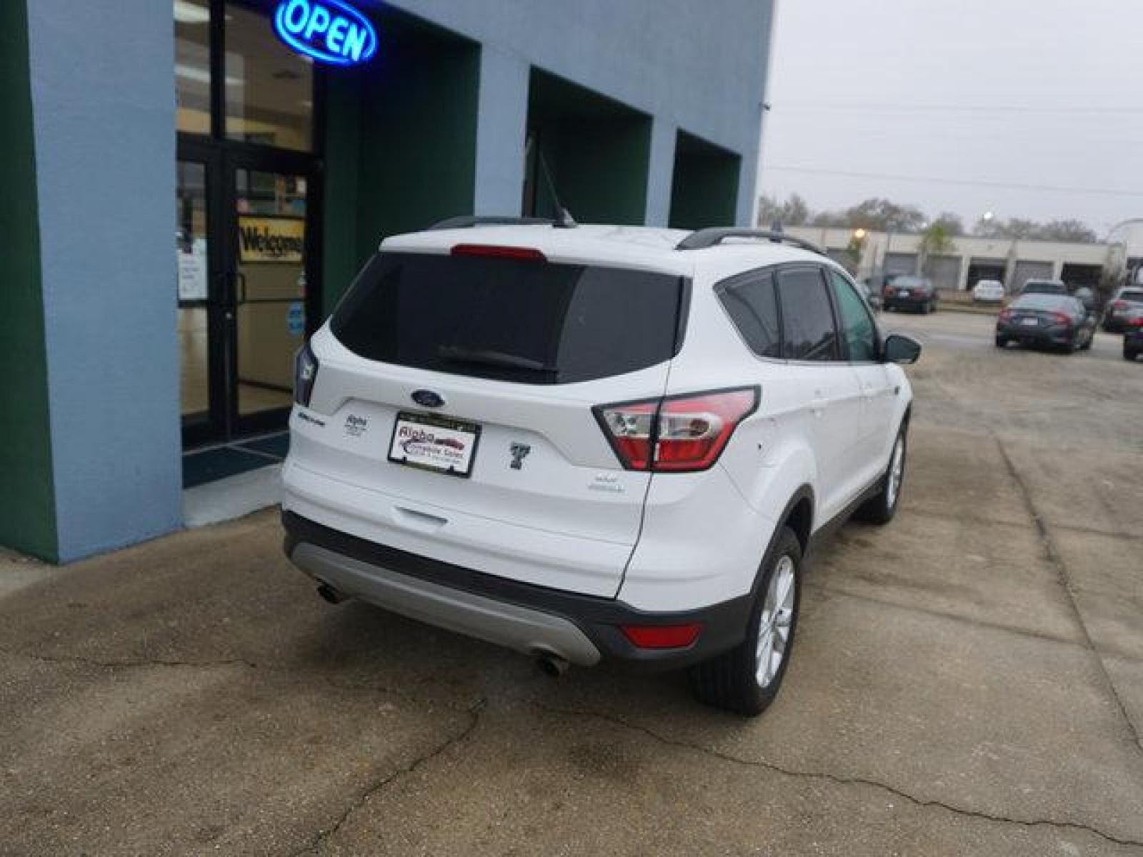 2018 White Ford Escape (1FMCU0GD4JU) with an 1.5L I4 EcoBoost engine, Automatic transmission, located at 6904 Johnston St., Lafayette, LA, 70503, (337) 988-1960, 30.143589, -92.100601 - Prices are subject to change as improvements done by the service dept. Prices are for Cash sales only, Plus TTL. This Vehicle is Serviced well and Warranties Available too. Easy Financing. Drives Great and everything works. Price subject to change as improvements done by the service dept. Easy CR - Photo #10