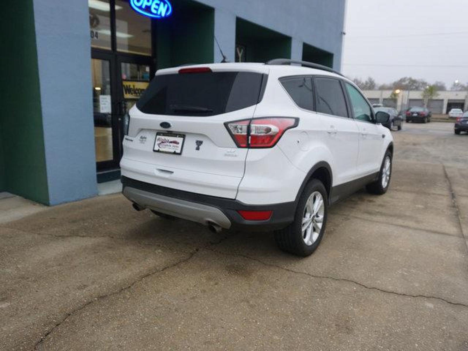 2018 White Ford Escape (1FMCU0GD4JU) with an 1.5L I4 EcoBoost engine, Automatic transmission, located at 6904 Johnston St., Lafayette, LA, 70503, (337) 988-1960, 30.143589, -92.100601 - Prices are subject to change as improvements done by the service dept. Prices are for Cash sales only, Plus TTL. This Vehicle is Serviced well and Warranties Available too. Easy Financing. Drives Great and everything works. Price subject to change as improvements done by the service dept. Easy CR - Photo #11