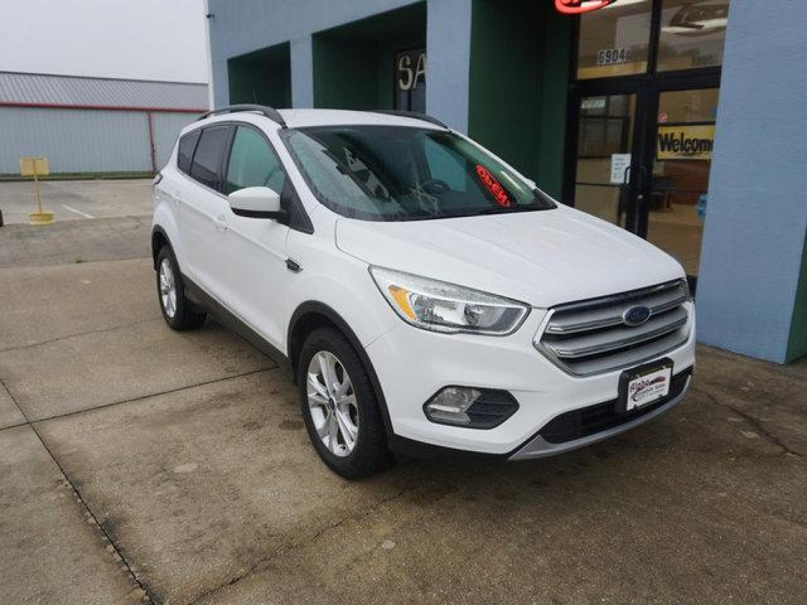 2018 White Ford Escape (1FMCU0GD4JU) with an 1.5L I4 EcoBoost engine, Automatic transmission, located at 6904 Johnston St., Lafayette, LA, 70503, (337) 988-1960, 30.143589, -92.100601 - Prices are subject to change as improvements done by the service dept. Prices are for Cash sales only, Plus TTL. This Vehicle is Serviced well and Warranties Available too. Easy Financing. Drives Great and everything works. Price subject to change as improvements done by the service dept. Easy CR - Photo #1