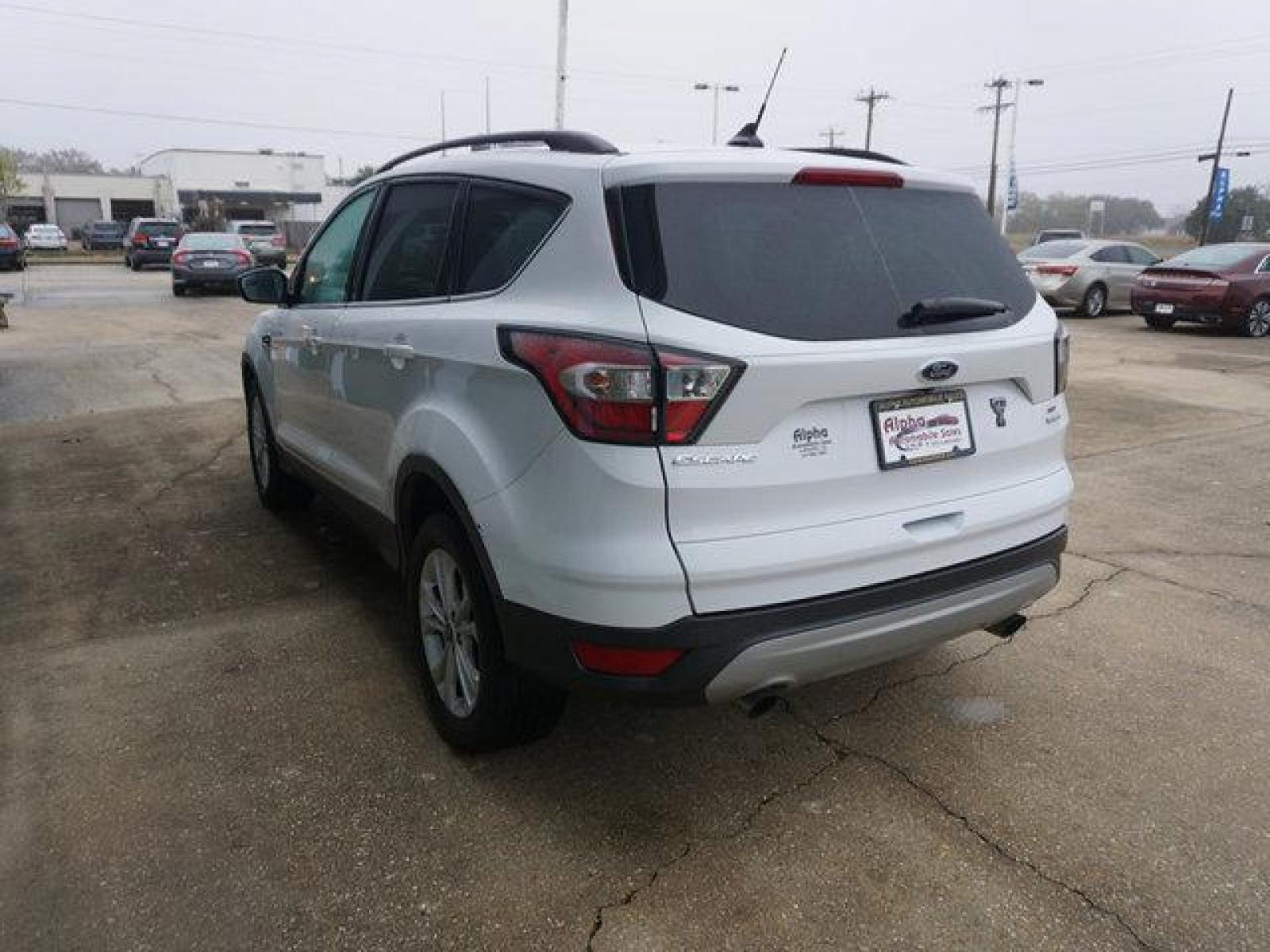 2018 White Ford Escape (1FMCU0GD4JU) with an 1.5L I4 EcoBoost engine, Automatic transmission, located at 6904 Johnston St., Lafayette, LA, 70503, (337) 988-1960, 30.143589, -92.100601 - Prices are subject to change as improvements done by the service dept. Prices are for Cash sales only, Plus TTL. This Vehicle is Serviced well and Warranties Available too. Easy Financing. Drives Great and everything works. Price subject to change as improvements done by the service dept. Easy CR - Photo #7