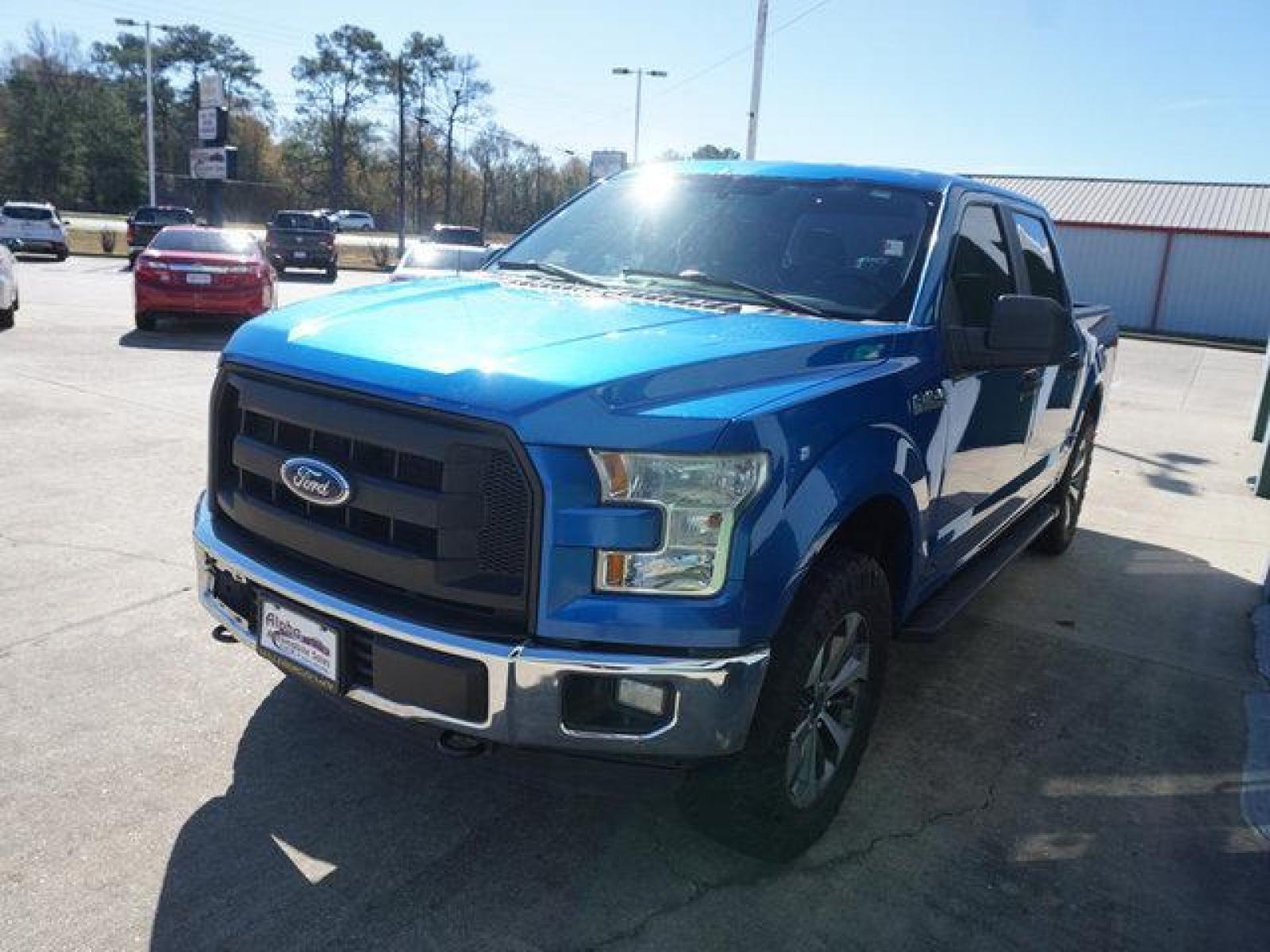 2015 Blue Ford F-150 (1FTEW1E88FK) with an 3.5L 6 Cyl engine, 6 Spd Automatic transmission, located at 6904 Johnston St., Lafayette, LA, 70503, (337) 988-1960, 30.143589, -92.100601 - Prices are subject to change as improvements done by the service dept. Prices are for Cash sales only, Plus TTL. This Vehicle is Serviced well and Warranties Available too. Easy Financing. Drives Great and everything works. Price subject to change as improvements done by the service dept. Easy CR - Photo #4