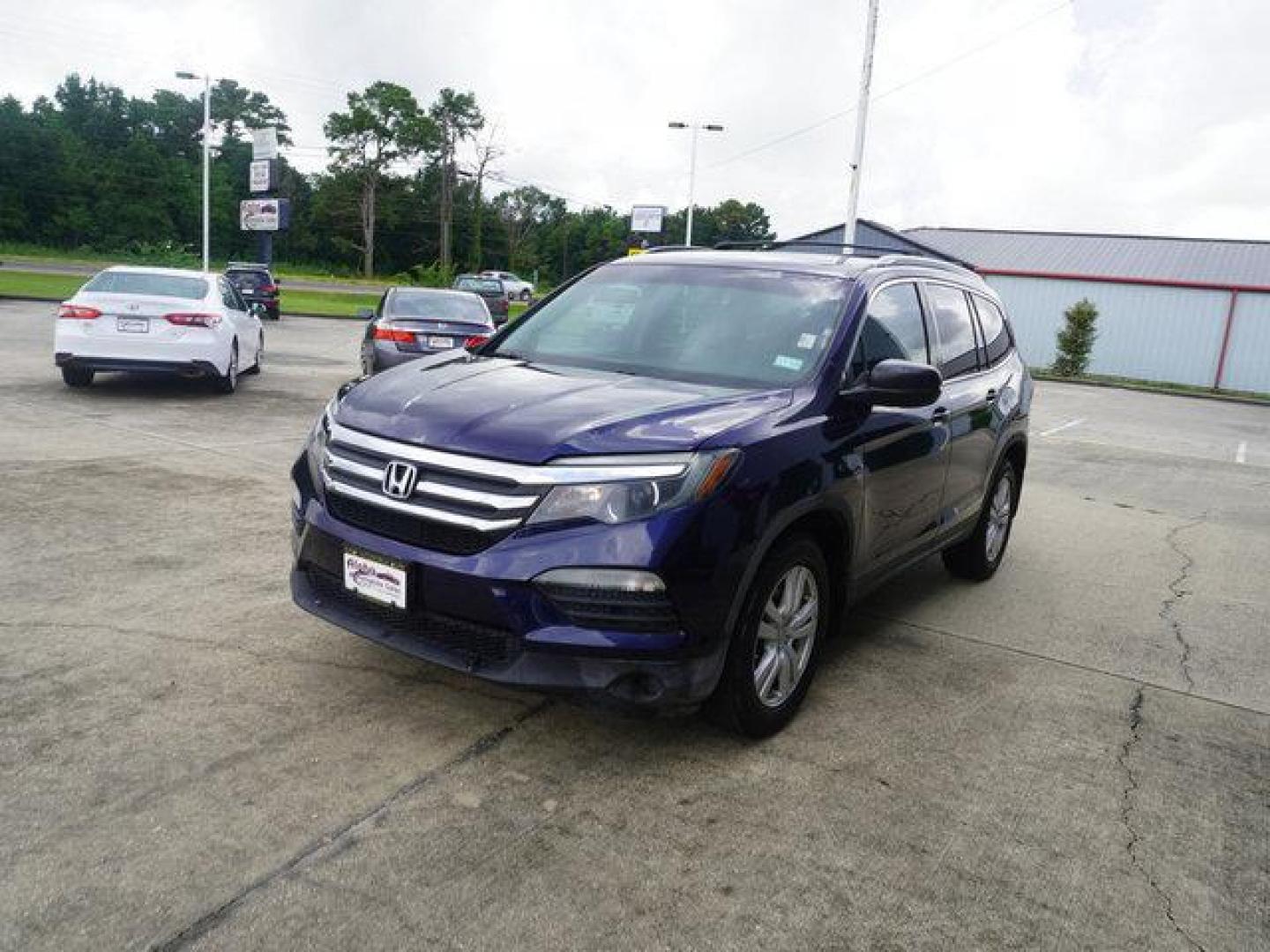 2016 Obsidian Blue Pearl /Beige Honda Pilot 2WD 4dr LX (5FNYF5H14GB) with an 3.5L V6 engine, Automatic transmission, located at 6904 Johnston St., Lafayette, LA, 70503, (337) 988-1960, 30.143589, -92.100601 - Photo#36