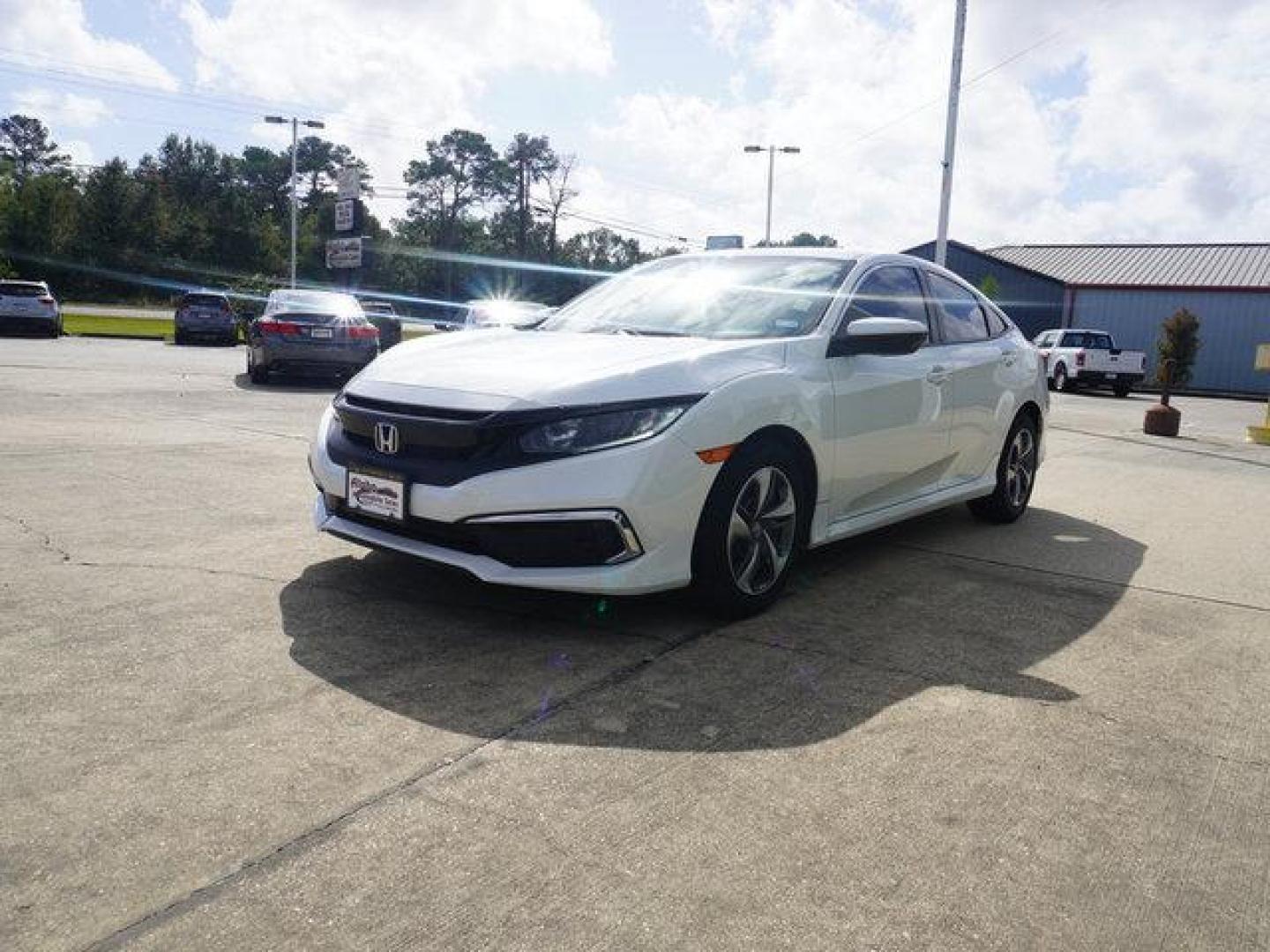 2020 White /Black Honda Civic LX CVT (19XFC2F67LE) with an 2.0L 4Cyl engine, CVT transmission, located at 6904 Johnston St., Lafayette, LA, 70503, (337) 988-1960, 30.143589, -92.100601 - Photo#40