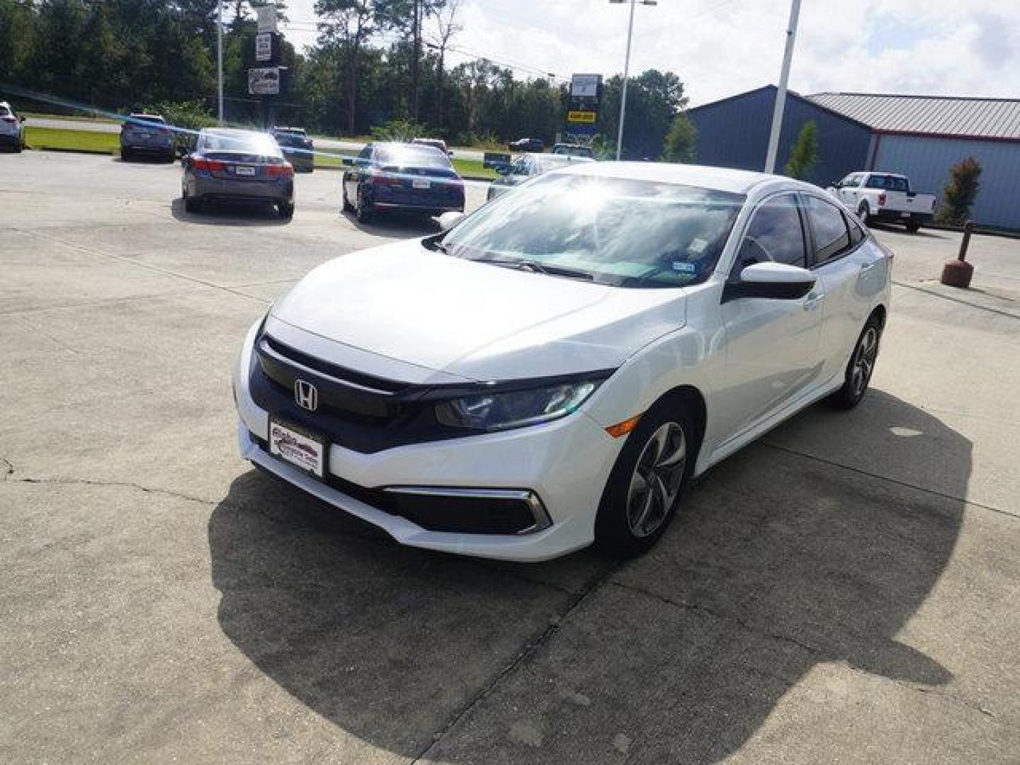 2020 White /Black Honda Civic LX CVT (19XFC2F67LE) with an 2.0L 4Cyl engine, CVT transmission, located at 6904 Johnston St., Lafayette, LA, 70503, (337) 988-1960, 30.143589, -92.100601 - Photo#5
