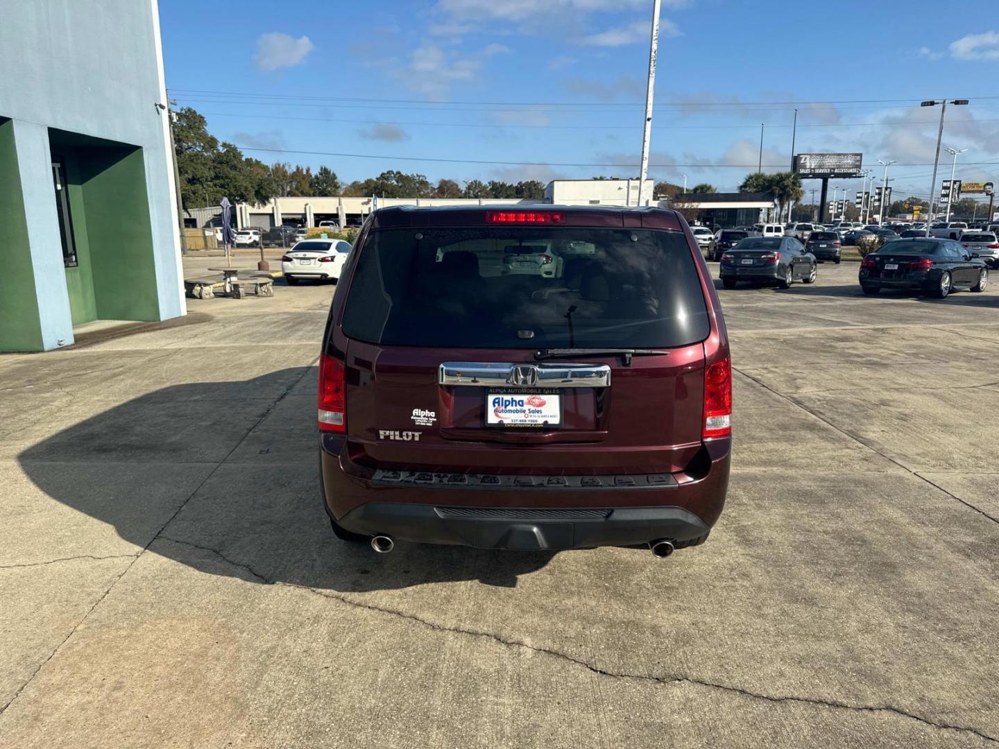 2013 Red /Beige Honda Pilot 2WD 4dr EX (5FNYF3H4XDB) , N/A transmission, located at 6904 Johnston St., Lafayette, LA, 70503, (337) 988-1960, 30.143589, -92.100601 - Photo#9