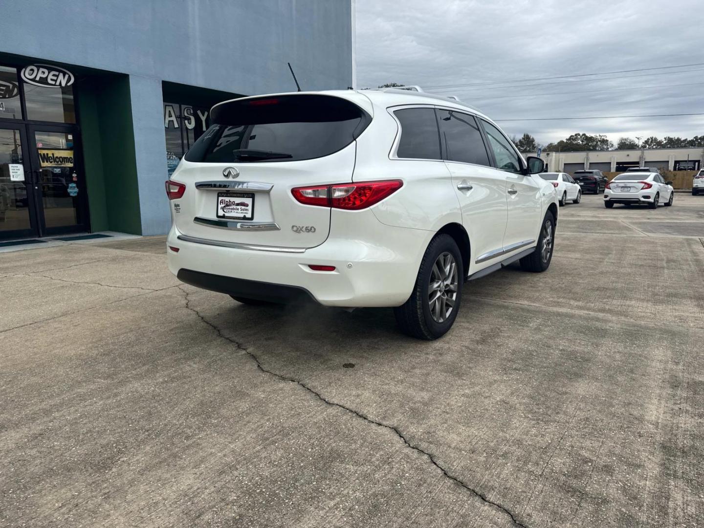 2015 Majestic White /Tan INFINITI QX60 FWD 4dr (5N1AL0MN6FC) , Automatic transmission, located at 6904 Johnston St., Lafayette, LA, 70503, (337) 988-1960, 30.143589, -92.100601 - Photo#12
