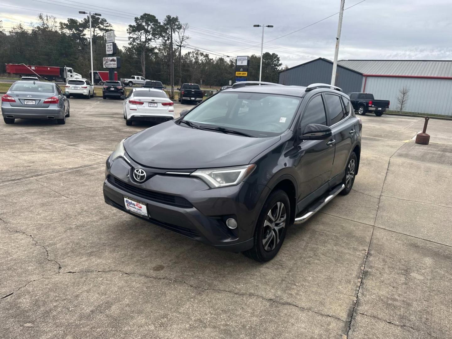 2016 Magnetic Gray Metallic /Gray Toyota RAV4 FWD 4dr LE (Natl) (2T3ZFREV8GW) , N/A transmission, located at 6904 Johnston St., Lafayette, LA, 70503, (337) 988-1960, 30.143589, -92.100601 - Photo#4