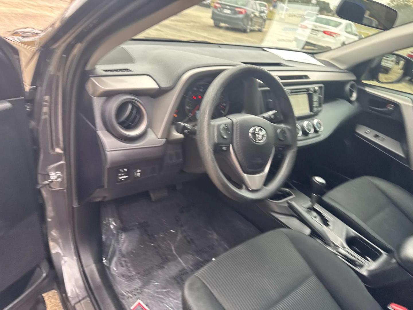2016 Magnetic Gray Metallic /Gray Toyota RAV4 FWD 4dr LE (Natl) (2T3ZFREV8GW) , N/A transmission, located at 6904 Johnston St., Lafayette, LA, 70503, (337) 988-1960, 30.143589, -92.100601 - Photo#24