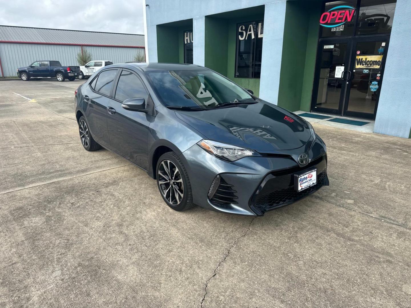 2018 Blue Crush Metallic /Black Toyota Corolla SE Manual (Natl) (5YFBURHE9JP) , N/A transmission, located at 6904 Johnston St., Lafayette, LA, 70503, (337) 988-1960, 30.143589, -92.100601 - Photo#1