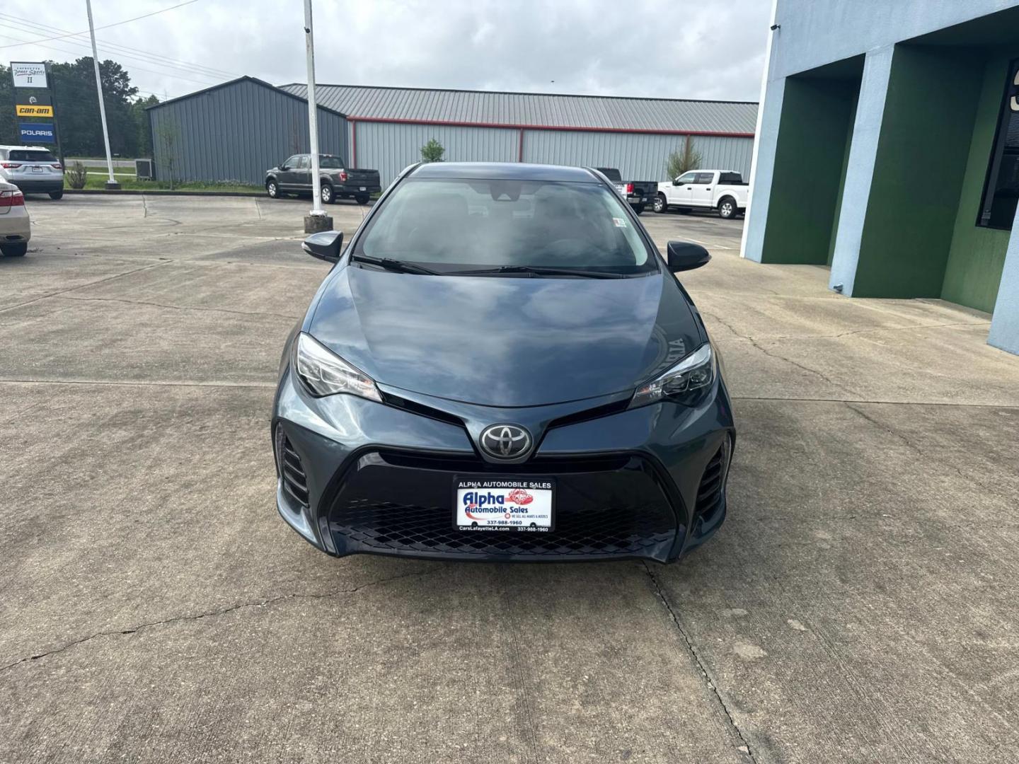 2018 Blue Crush Metallic /Black Toyota Corolla SE Manual (Natl) (5YFBURHE9JP) , N/A transmission, located at 6904 Johnston St., Lafayette, LA, 70503, (337) 988-1960, 30.143589, -92.100601 - Photo#2