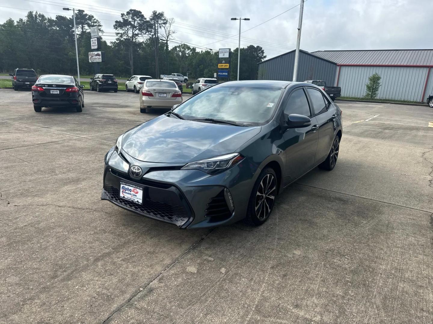 2018 Blue Crush Metallic /Black Toyota Corolla SE Manual (Natl) (5YFBURHE9JP) , N/A transmission, located at 6904 Johnston St., Lafayette, LA, 70503, (337) 988-1960, 30.143589, -92.100601 - Photo#4