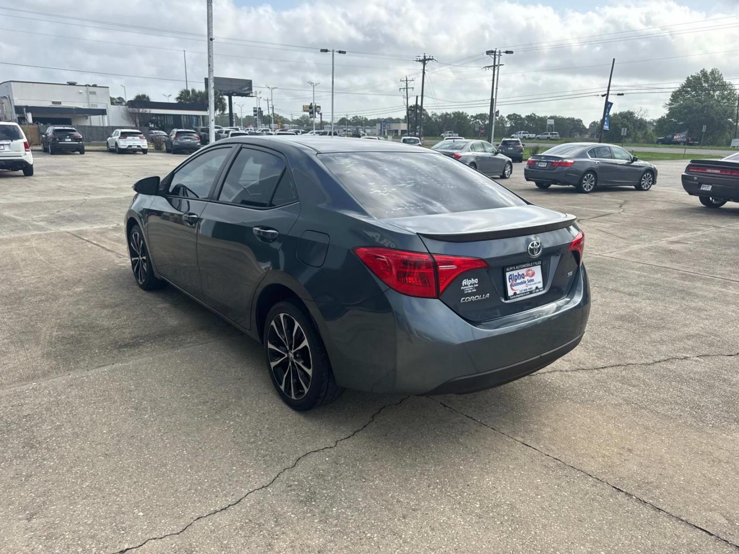2018 Blue Crush Metallic /Black Toyota Corolla SE Manual (Natl) (5YFBURHE9JP) , N/A transmission, located at 6904 Johnston St., Lafayette, LA, 70503, (337) 988-1960, 30.143589, -92.100601 - Photo#7