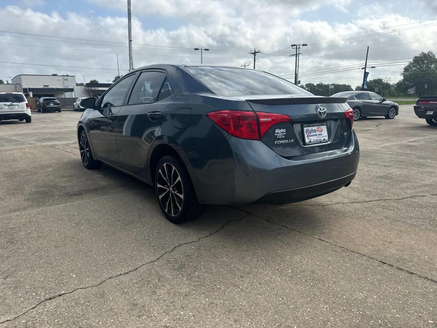 2018 Blue Crush Metallic /Black Toyota Corolla SE Manual (Natl) (5YFBURHE9JP) , N/A transmission, located at 6904 Johnston St., Lafayette, LA, 70503, (337) 988-1960, 30.143589, -92.100601 - Photo#8