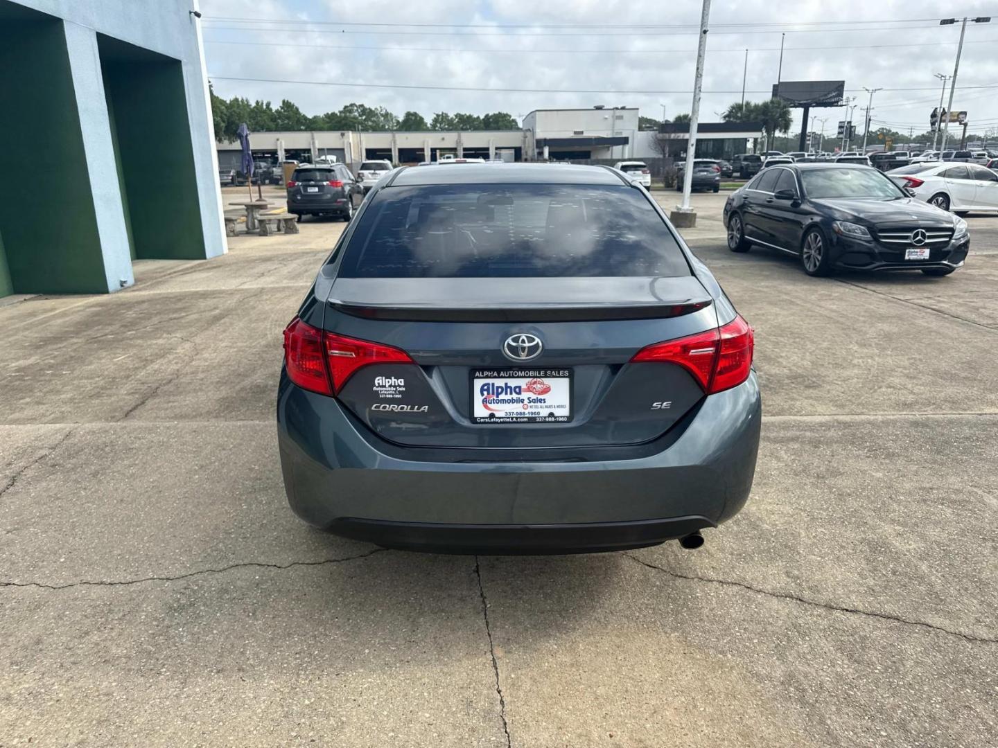 2018 Blue Crush Metallic /Black Toyota Corolla SE Manual (Natl) (5YFBURHE9JP) , N/A transmission, located at 6904 Johnston St., Lafayette, LA, 70503, (337) 988-1960, 30.143589, -92.100601 - Photo#9