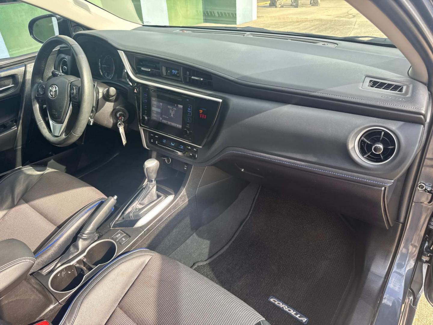 2018 Blue Crush Metallic /Black Toyota Corolla SE Manual (Natl) (5YFBURHE9JP) , N/A transmission, located at 6904 Johnston St., Lafayette, LA, 70503, (337) 988-1960, 30.143589, -92.100601 - Photo#16
