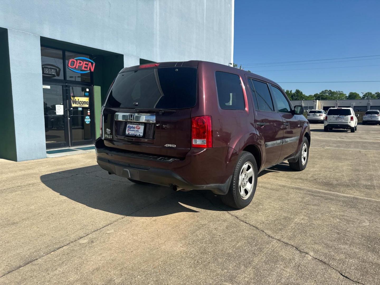 2014 Dark Cherry Pearl /Beige Honda Pilot 4WD 4dr LX (5FNYF4H20EB) , Automatic transmission, located at 6904 Johnston St., Lafayette, LA, 70503, (337) 988-1960, 30.143589, -92.100601 - Photo#12