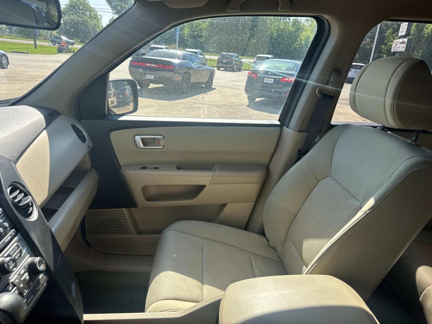 2014 Dark Cherry Pearl /Beige Honda Pilot 4WD 4dr LX (5FNYF4H20EB) , Automatic transmission, located at 6904 Johnston St., Lafayette, LA, 70503, (337) 988-1960, 30.143589, -92.100601 - Photo#21