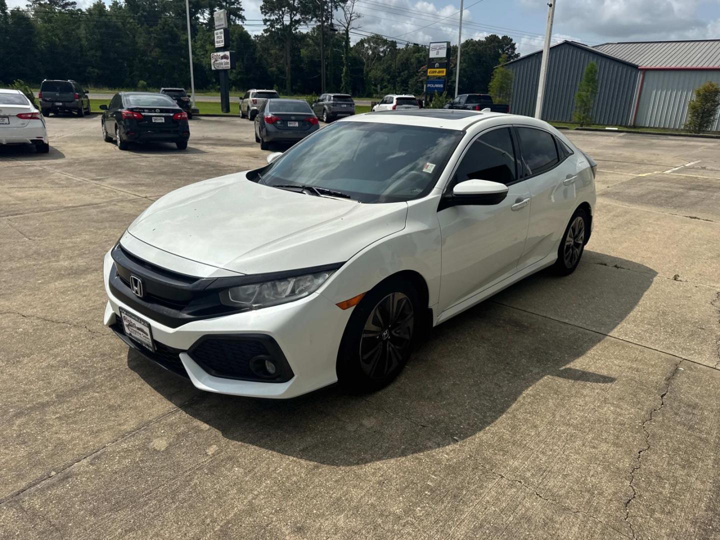 2017 White /Black Honda Civic Hatchback EX CVT (SHHFK7H50HU) , Automatic transmission, located at 6904 Johnston St., Lafayette, LA, 70503, (337) 988-1960, 30.143589, -92.100601 - Photo#4