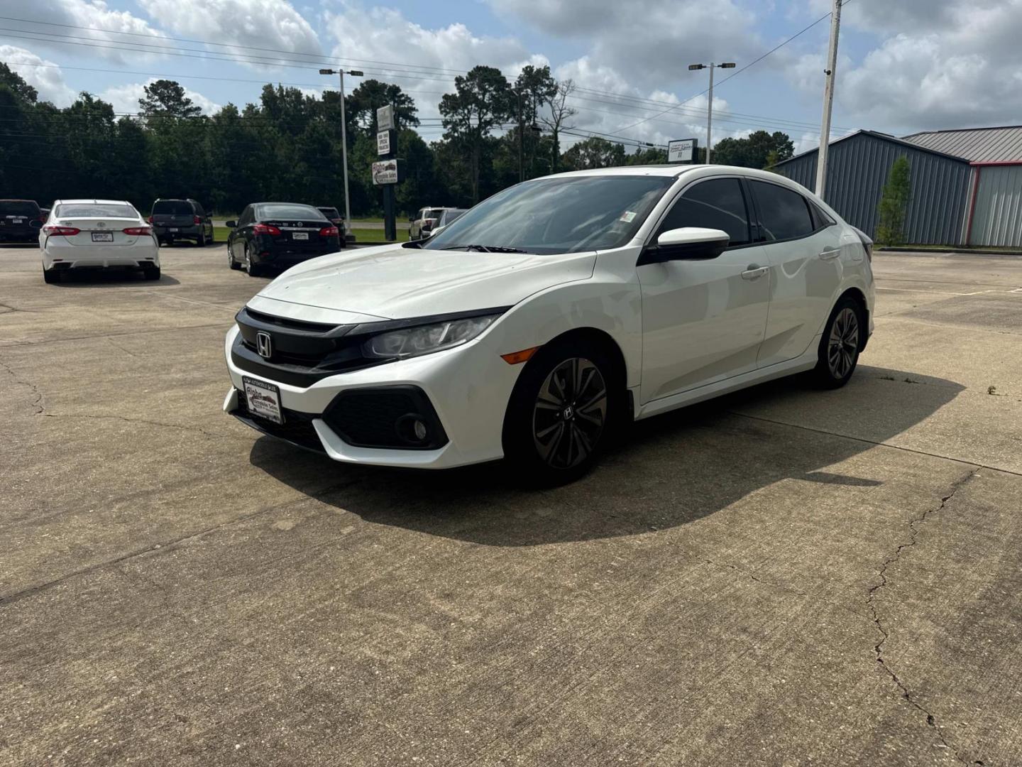 2017 White /Black Honda Civic Hatchback EX CVT (SHHFK7H50HU) , Automatic transmission, located at 6904 Johnston St., Lafayette, LA, 70503, (337) 988-1960, 30.143589, -92.100601 - Photo#5