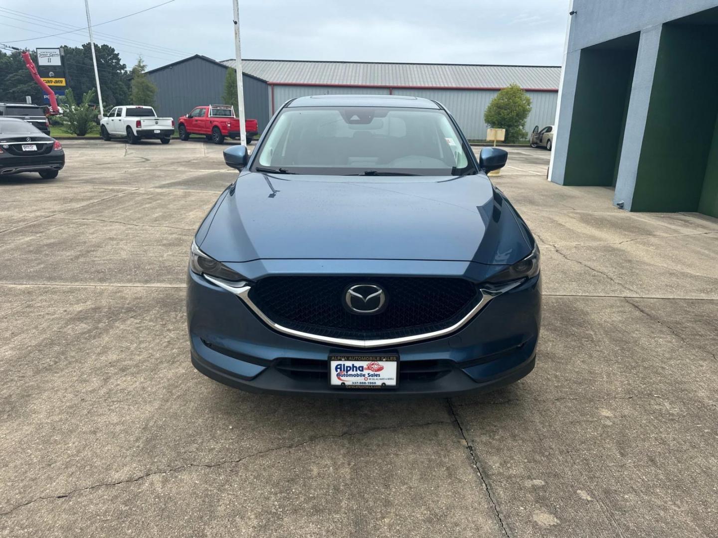 2018 Deep Crystal Blue Mica /Black Mazda CX-5 Grand Touring AWD (JM3KFBDM3J0) , Automatic transmission, located at 6904 Johnston St., Lafayette, LA, 70503, (337) 988-1960, 30.143589, -92.100601 - Photo#3