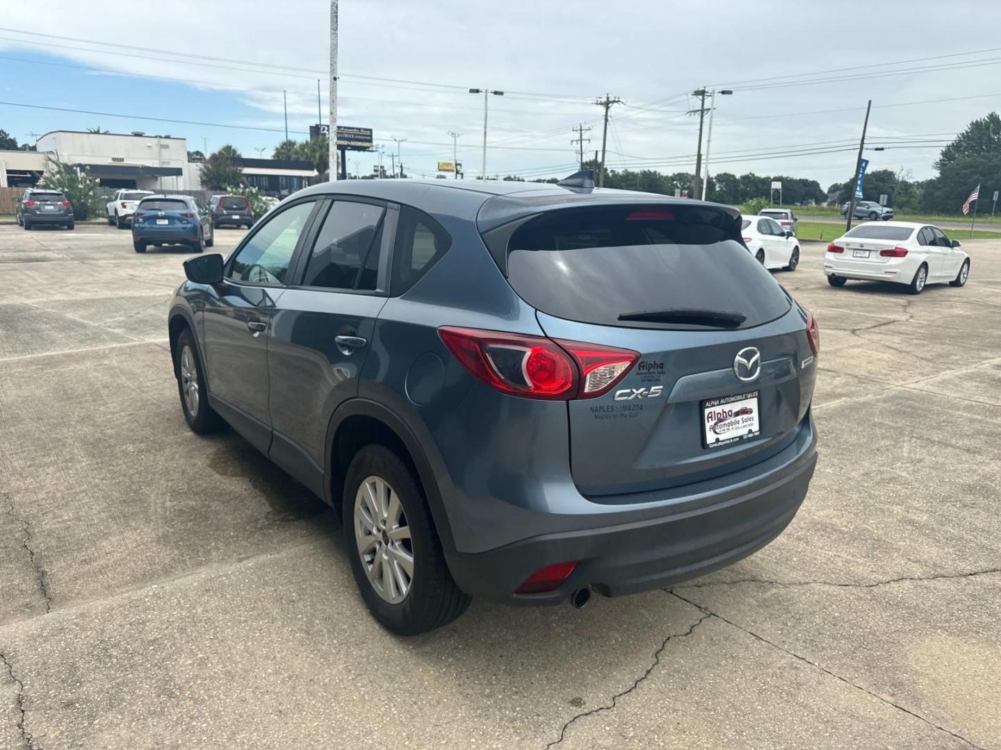 2016 Blue Reflex Mica /Black Mazda CX-5 FWD 4dr Auto Touring (JM3KE2CYXG0) , Automatic transmission, located at 6904 Johnston St., Lafayette, LA, 70503, (337) 988-1960, 30.143589, -92.100601 - Photo#8