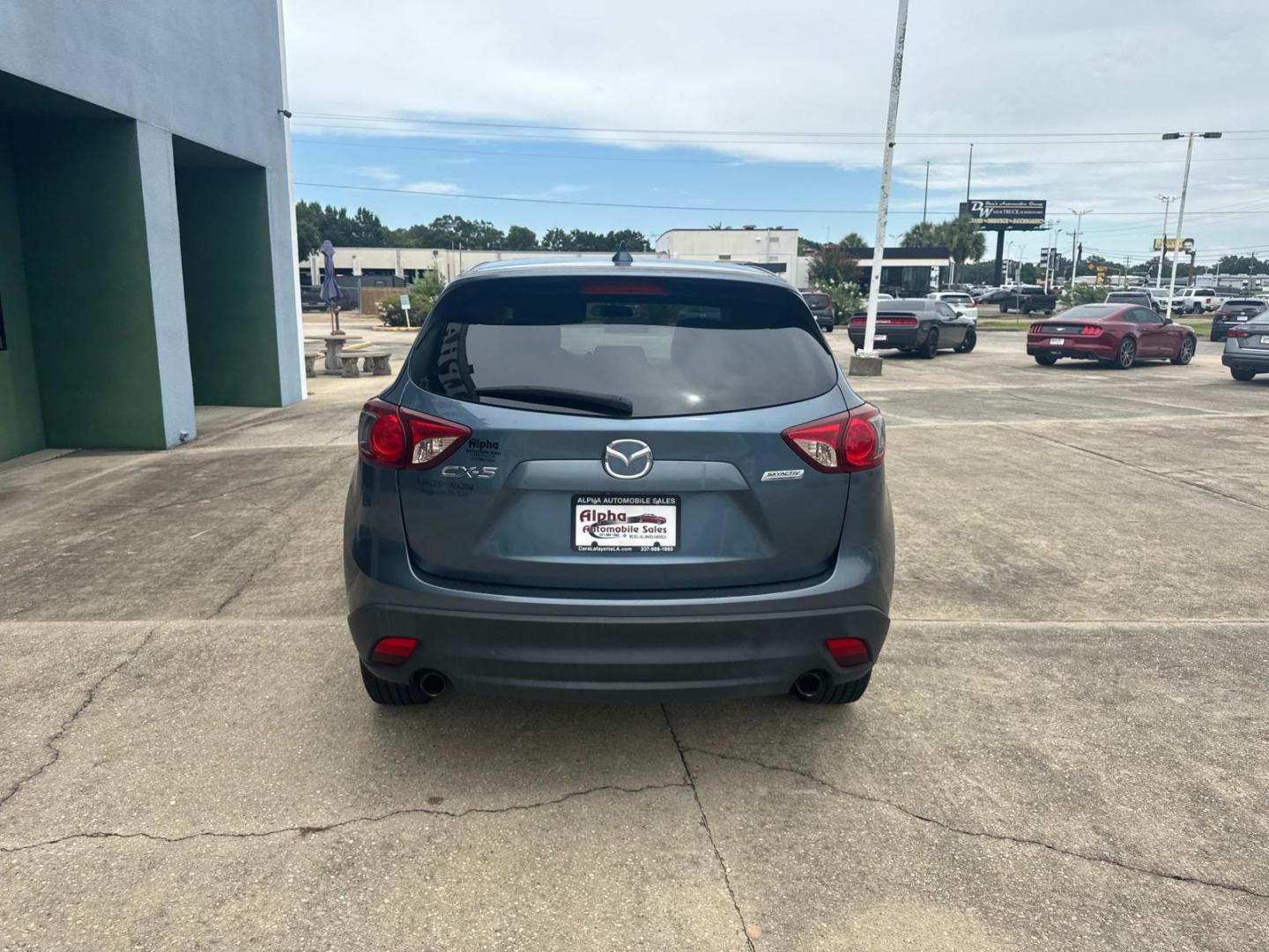 2016 Blue Reflex Mica /Black Mazda CX-5 FWD 4dr Auto Touring (JM3KE2CYXG0) , Automatic transmission, located at 6904 Johnston St., Lafayette, LA, 70503, (337) 988-1960, 30.143589, -92.100601 - Photo#10