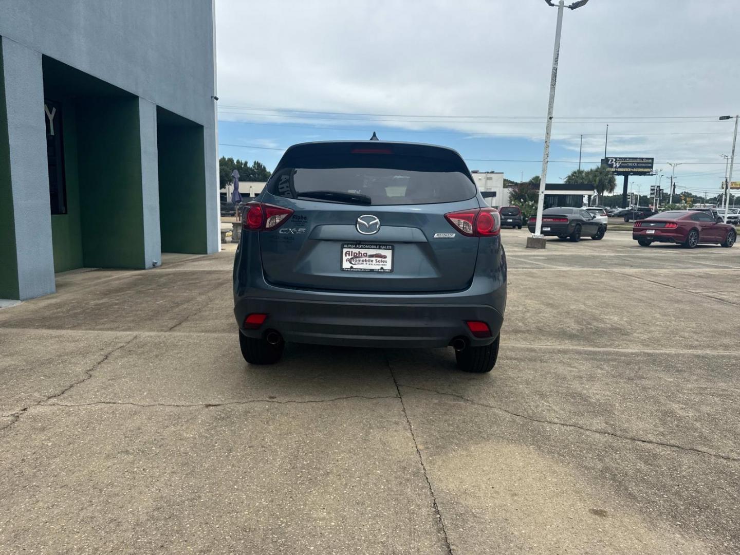 2016 Blue Reflex Mica /Black Mazda CX-5 FWD 4dr Auto Touring (JM3KE2CYXG0) , Automatic transmission, located at 6904 Johnston St., Lafayette, LA, 70503, (337) 988-1960, 30.143589, -92.100601 - Photo#11