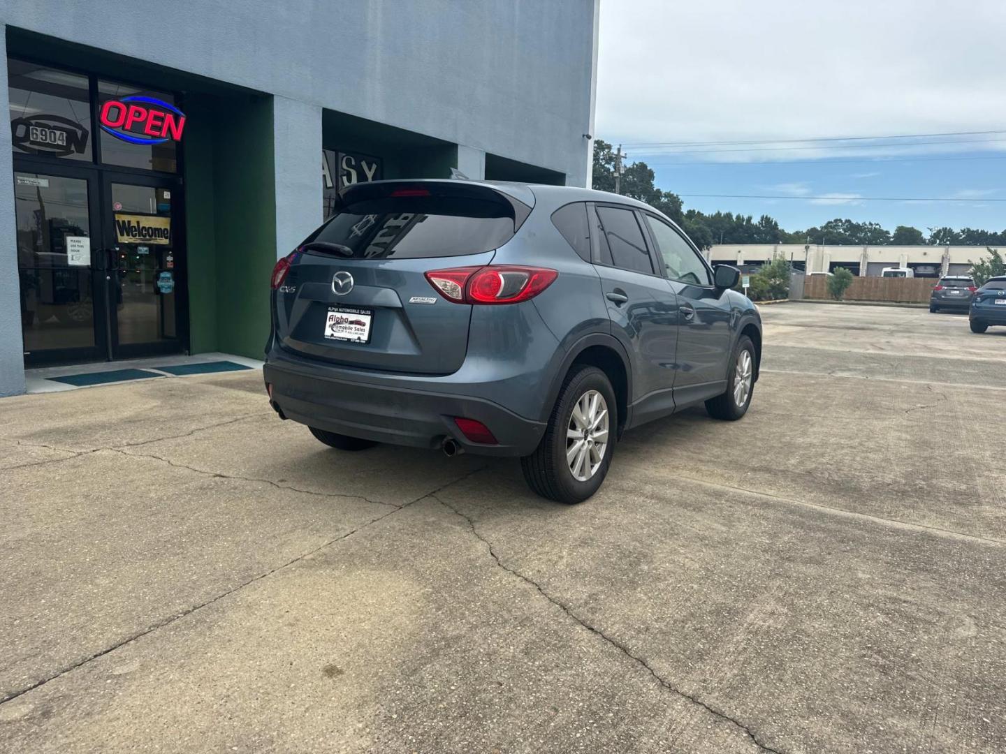 2016 Blue Reflex Mica /Black Mazda CX-5 FWD 4dr Auto Touring (JM3KE2CYXG0) , Automatic transmission, located at 6904 Johnston St., Lafayette, LA, 70503, (337) 988-1960, 30.143589, -92.100601 - Photo#13