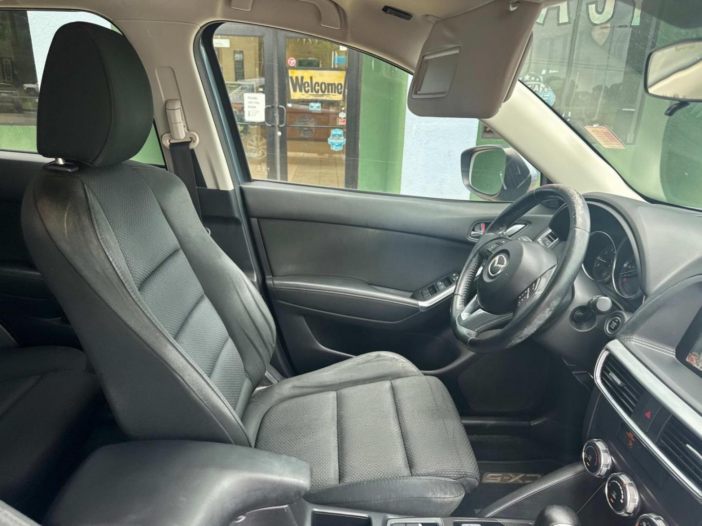 2016 Blue Reflex Mica /Black Mazda CX-5 FWD 4dr Auto Touring (JM3KE2CYXG0) , Automatic transmission, located at 6904 Johnston St., Lafayette, LA, 70503, (337) 988-1960, 30.143589, -92.100601 - Photo#16
