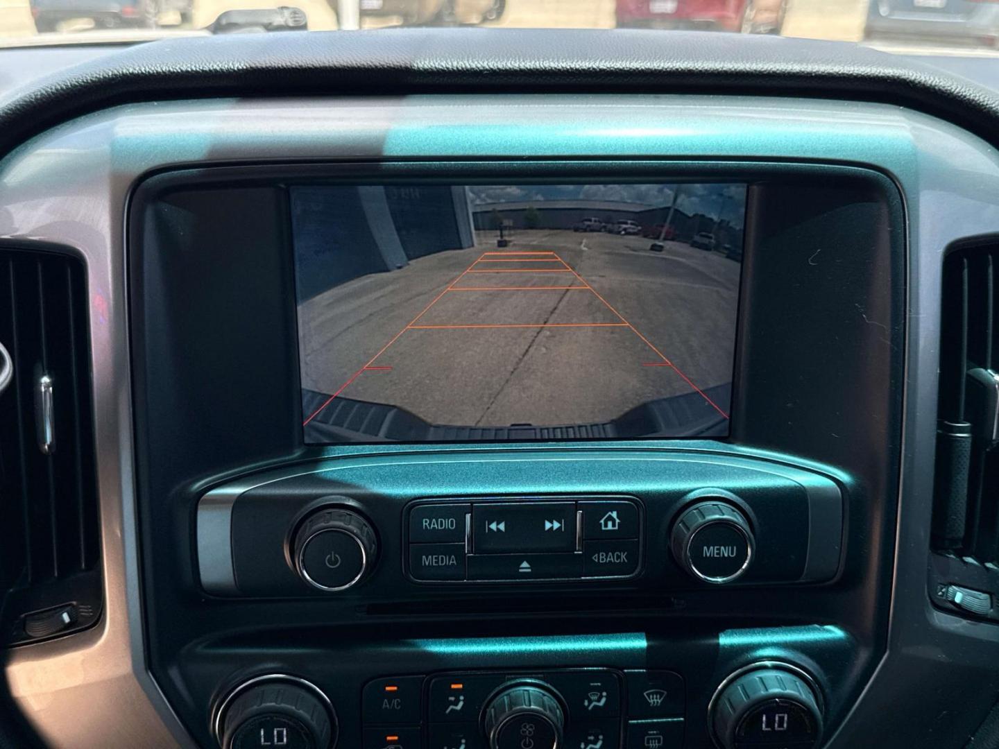 2015 Deep Ocean Blue Metallic /Jet Black Chevrolet Silverado 1500 4WD Crew Cab 143.5 LT w/1LT (3GCUKREC2FG) , Automatic transmission, located at 6904 Johnston St., Lafayette, LA, 70503, (337) 988-1960, 30.143589, -92.100601 - Photo#26