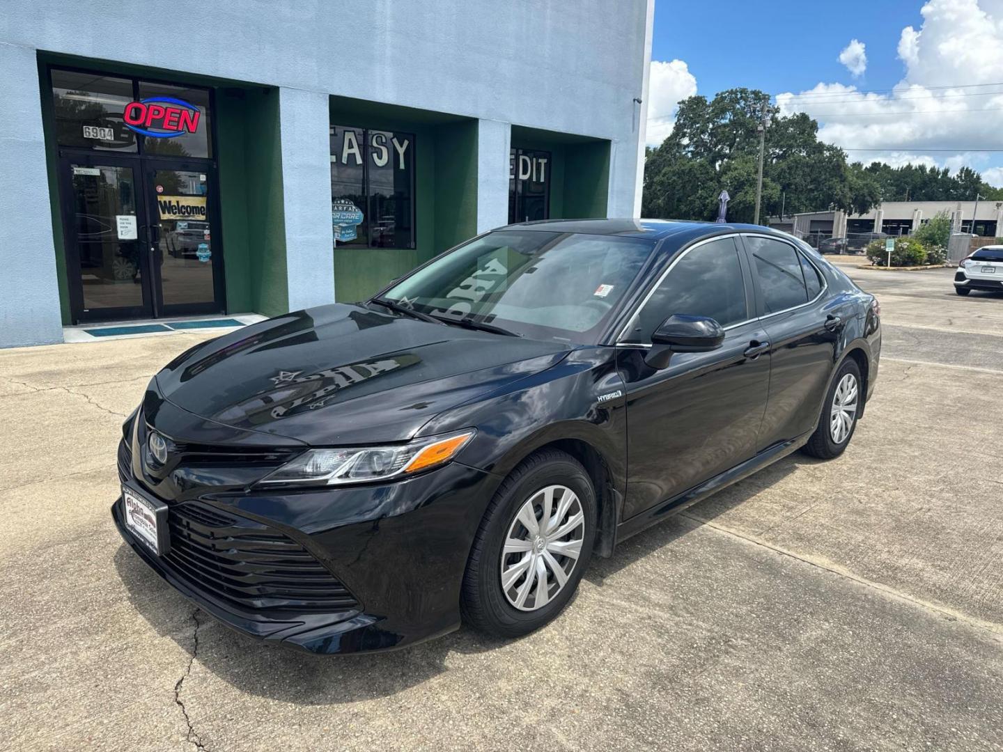 2020 Midnight Black Metallic /Black Toyota Camry Hybrid LE CVT (Natl) (4T1C31AK8LU) , Automatic transmission, located at 6904 Johnston St., Lafayette, LA, 70503, (337) 988-1960, 30.143589, -92.100601 - Photo#1