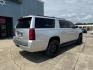 2015 Silver Ice Metallic /Jet Black Chevrolet Suburban 4WD 4dr LS (1GNSKHKC6FR) , Automatic transmission, located at 6904 Johnston St., Lafayette, LA, 70503, (337) 988-1960, 30.143589, -92.100601 - Photo#6