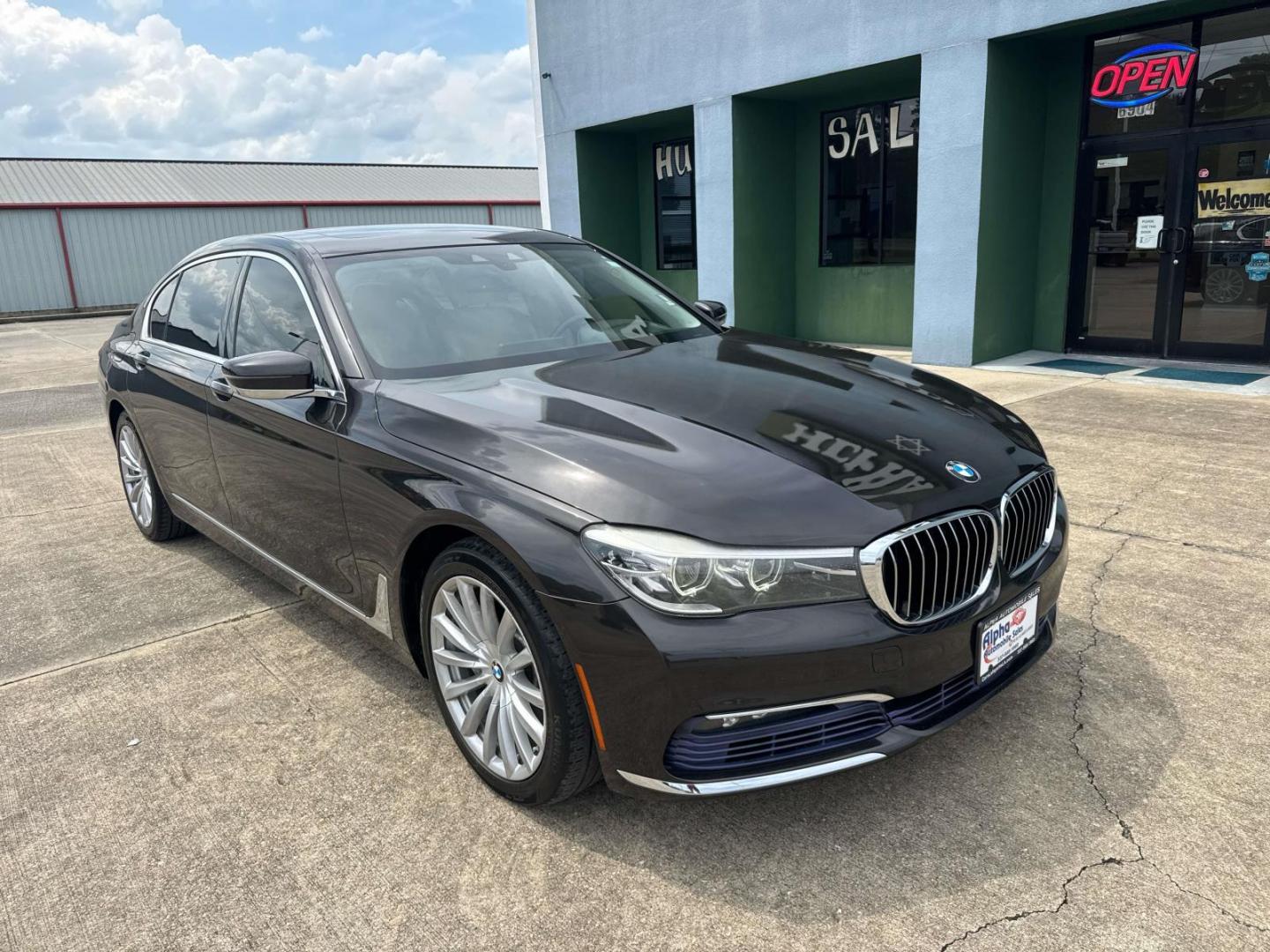 2016 Black /Canberra Beige BMW 7 Series 4dr Sdn 740i RWD (WBA7E2C53GG) , Automatic transmission, located at 6904 Johnston St., Lafayette, LA, 70503, (337) 988-1960, 30.143589, -92.100601 - Photo#1