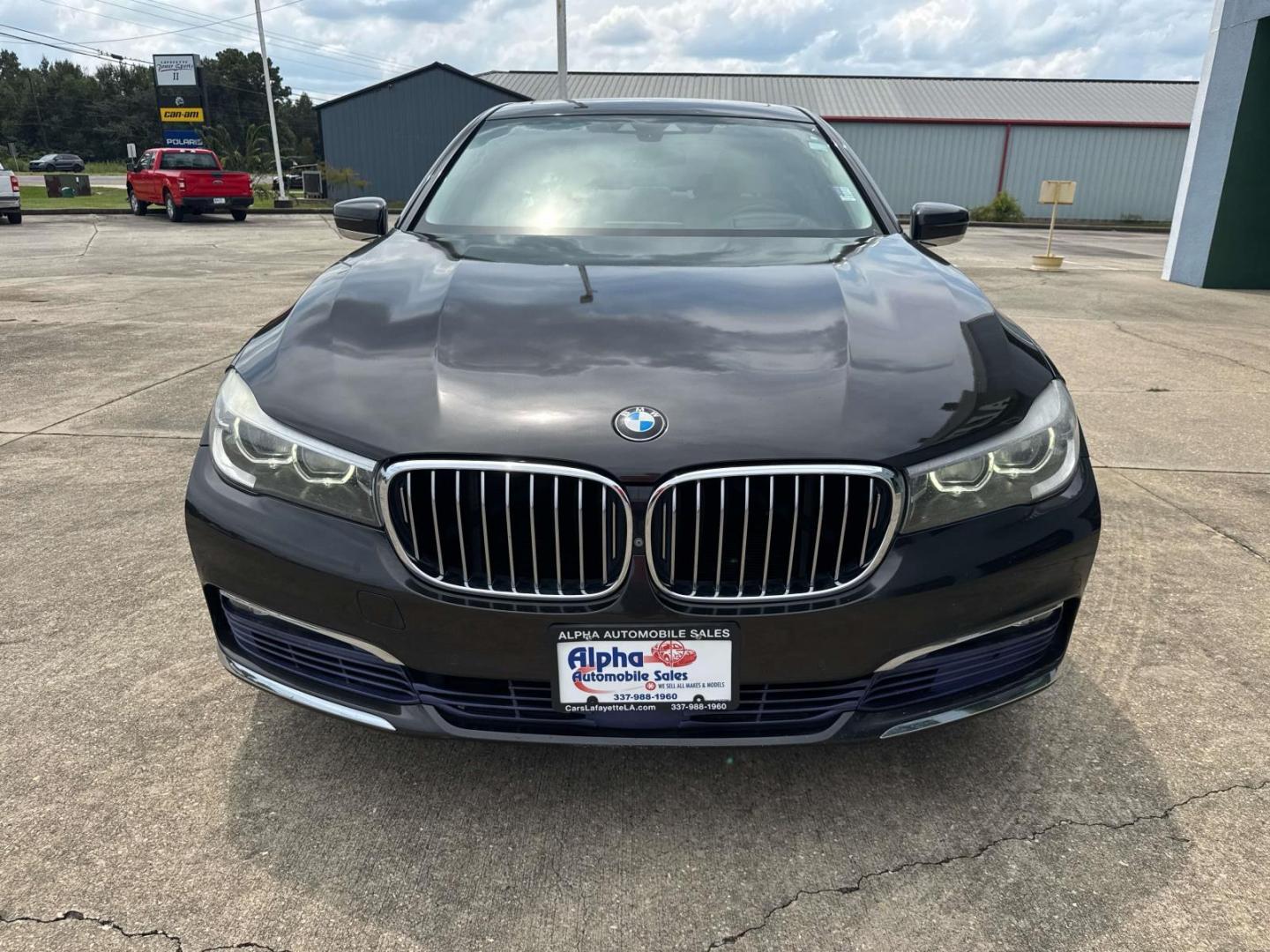 2016 Black /Canberra Beige BMW 7 Series 4dr Sdn 740i RWD (WBA7E2C53GG) , Automatic transmission, located at 6904 Johnston St., Lafayette, LA, 70503, (337) 988-1960, 30.143589, -92.100601 - Photo#4