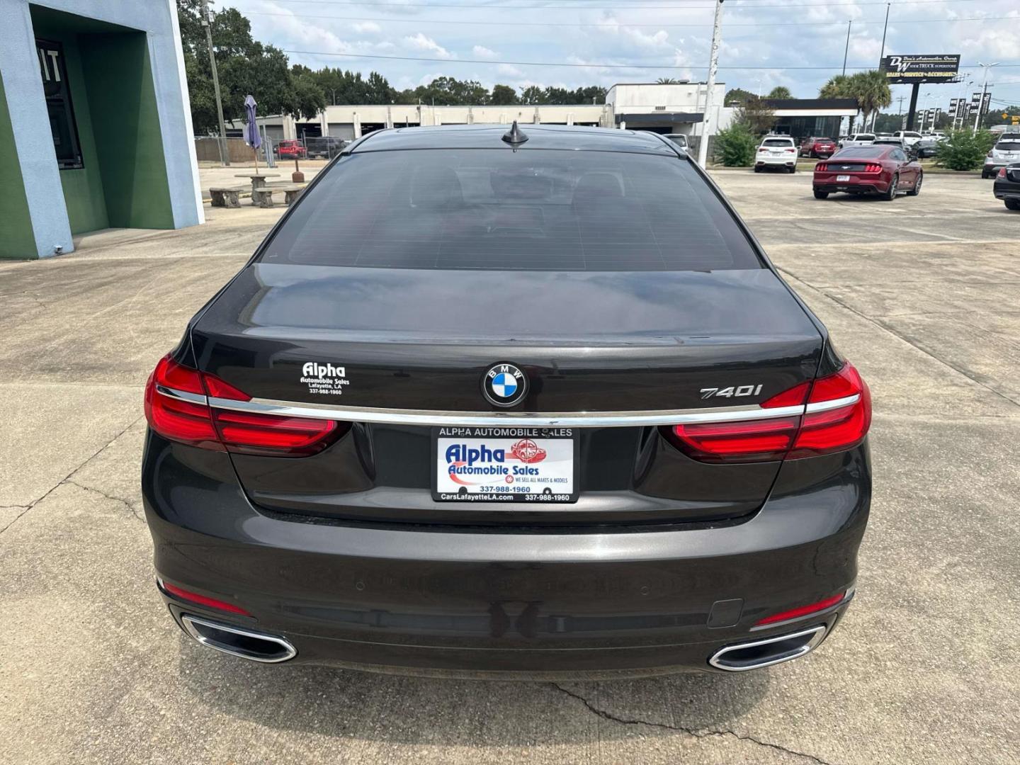 2016 Black /Canberra Beige BMW 7 Series 4dr Sdn 740i RWD (WBA7E2C53GG) , Automatic transmission, located at 6904 Johnston St., Lafayette, LA, 70503, (337) 988-1960, 30.143589, -92.100601 - Photo#10