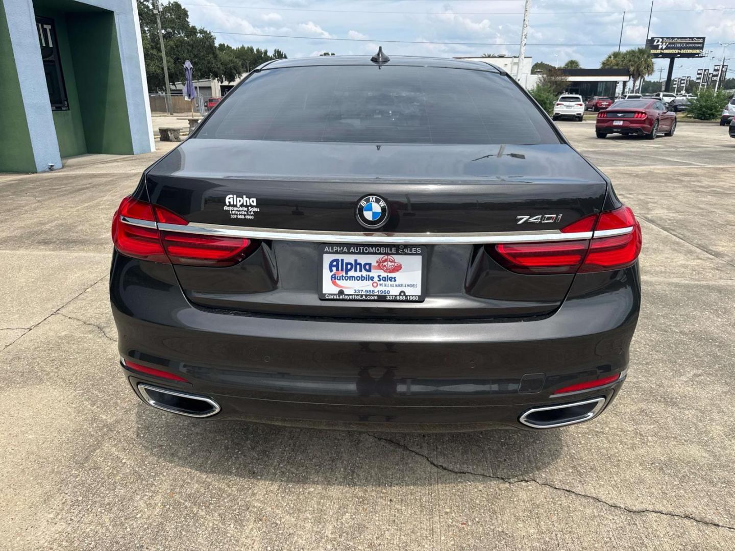 2016 Black /Canberra Beige BMW 7 Series 4dr Sdn 740i RWD (WBA7E2C53GG) , Automatic transmission, located at 6904 Johnston St., Lafayette, LA, 70503, (337) 988-1960, 30.143589, -92.100601 - Photo#11