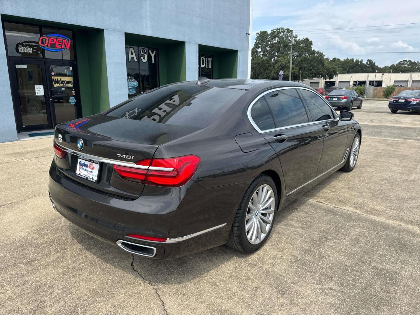 2016 Black /Canberra Beige BMW 7 Series 4dr Sdn 740i RWD (WBA7E2C53GG) , Automatic transmission, located at 6904 Johnston St., Lafayette, LA, 70503, (337) 988-1960, 30.143589, -92.100601 - Photo#12