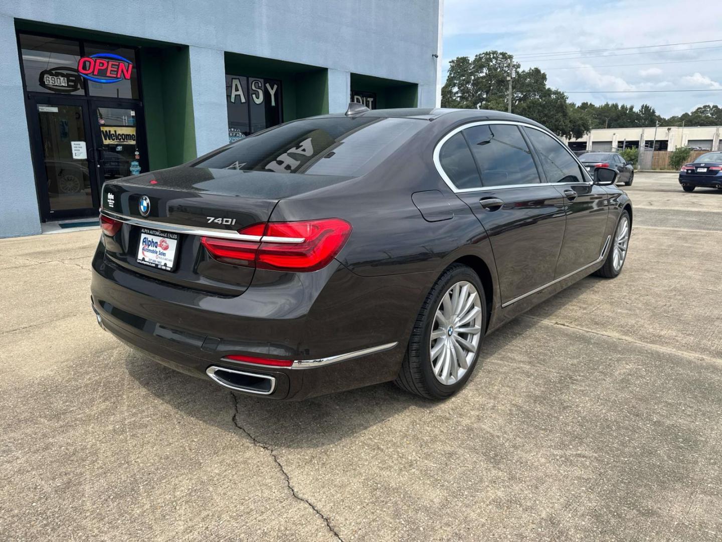 2016 Black /Canberra Beige BMW 7 Series 4dr Sdn 740i RWD (WBA7E2C53GG) , Automatic transmission, located at 6904 Johnston St., Lafayette, LA, 70503, (337) 988-1960, 30.143589, -92.100601 - Photo#13