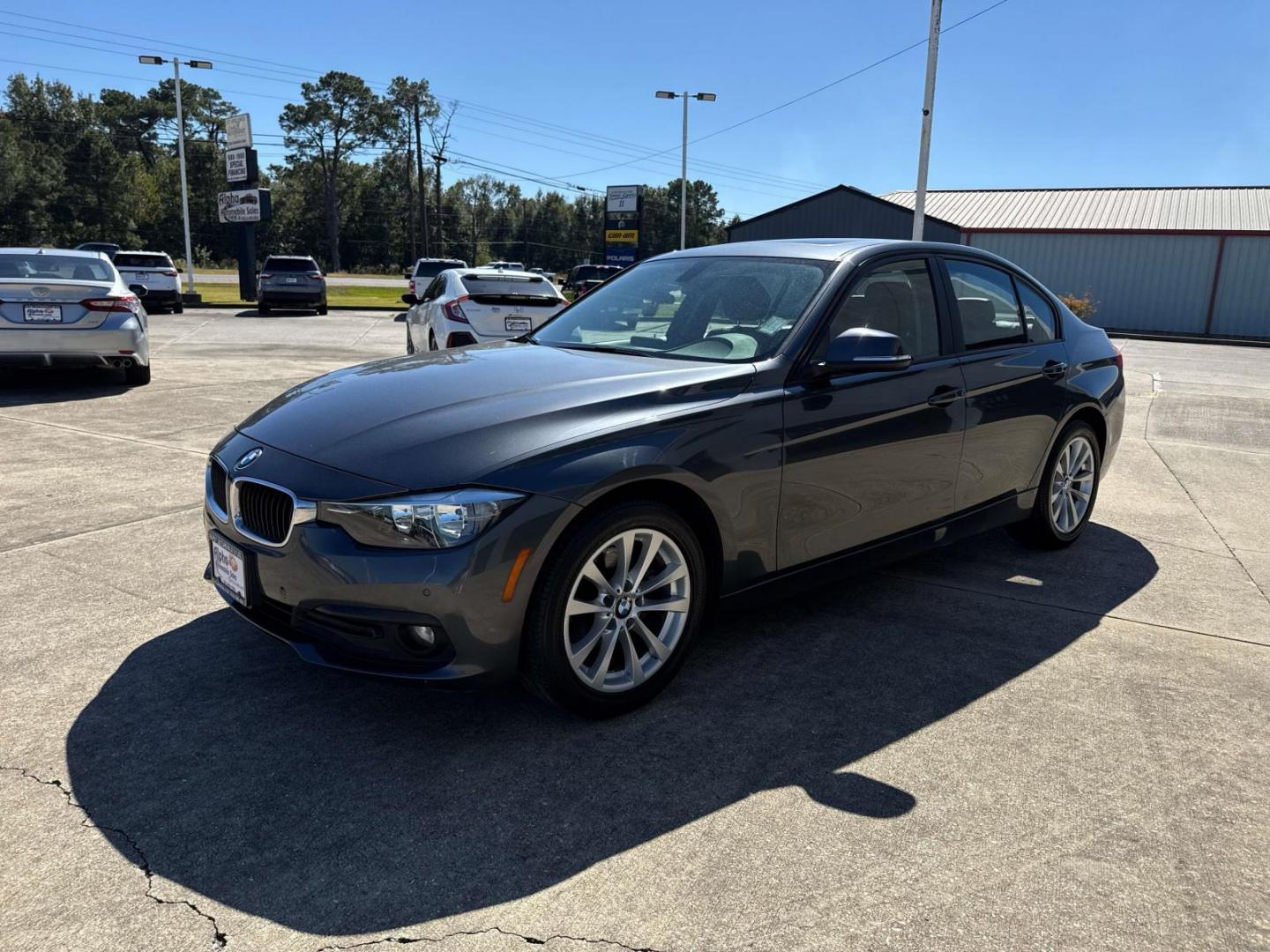 2016 Mineral Gray Metallic /Black BMW 3 Series 4dr Sdn 320i xDrive AWD South Africa (WBA8E5G52GN) , Automatic transmission, located at 6904 Johnston St., Lafayette, LA, 70503, (337) 988-1960, 30.143589, -92.100601 - Photo#2