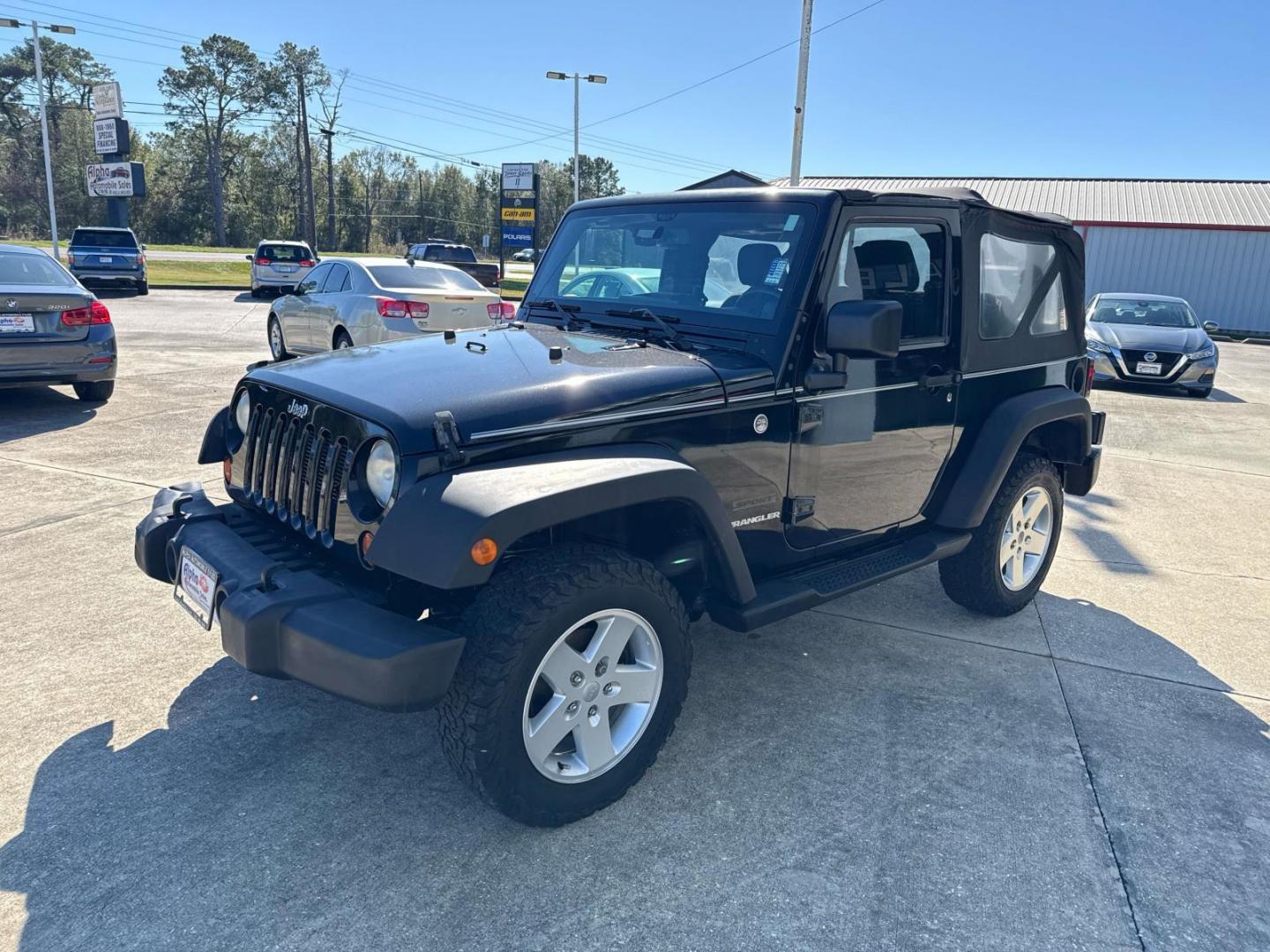 2013 Black /Black Interior Jeep Wrangler 4WD 2dr Sport (1C4AJWAG5DL) , Automatic transmission, located at 6904 Johnston St., Lafayette, LA, 70503, (337) 988-1960, 30.143589, -92.100601 - Photo#2