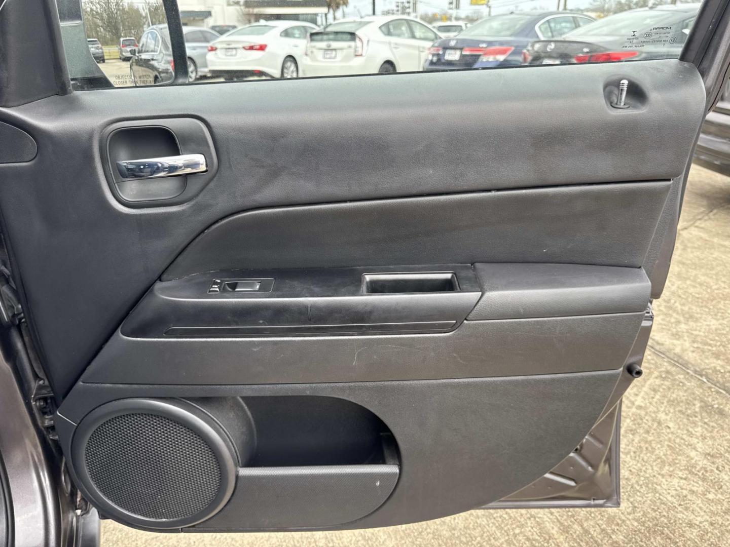 2017 Gray /Gray Jeep Patriot Latitude FWD (1C4NJPFB4HD) , Automatic transmission, located at 6904 Johnston St., Lafayette, LA, 70503, (337) 988-1960, 30.143589, -92.100601 - Photo#12