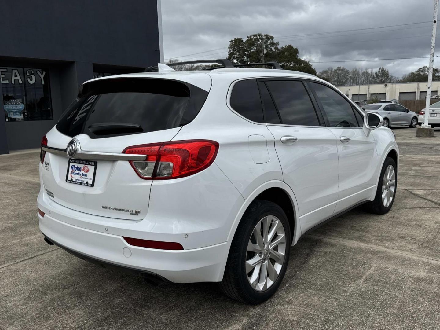 2017 White /Tan Buick Envision AWD 4dr Premium II (LRBFXFSX6HD) , Automatic transmission, located at 6904 Johnston St., Lafayette, LA, 70503, (337) 988-1960, 30.143589, -92.100601 - Photo#6