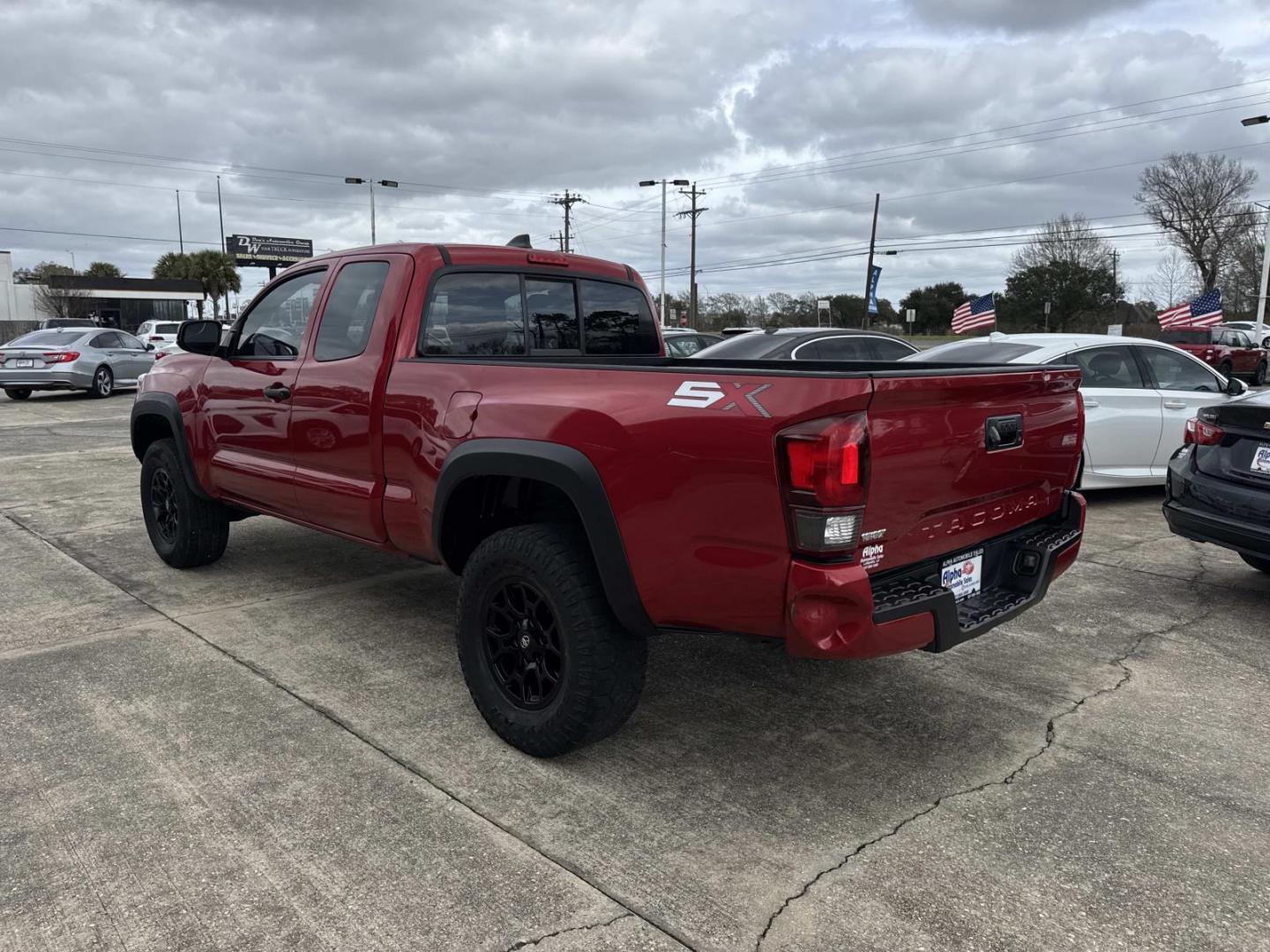2020 Red /Gray Toyota Tacoma 2WD SR Access Cab 6' Bed I4 AT (Natl) (3TYRX5GN6LT) , Automatic transmission, located at 6904 Johnston St., Lafayette, LA, 70503, (337) 988-1960, 30.143589, -92.100601 - Photo#4