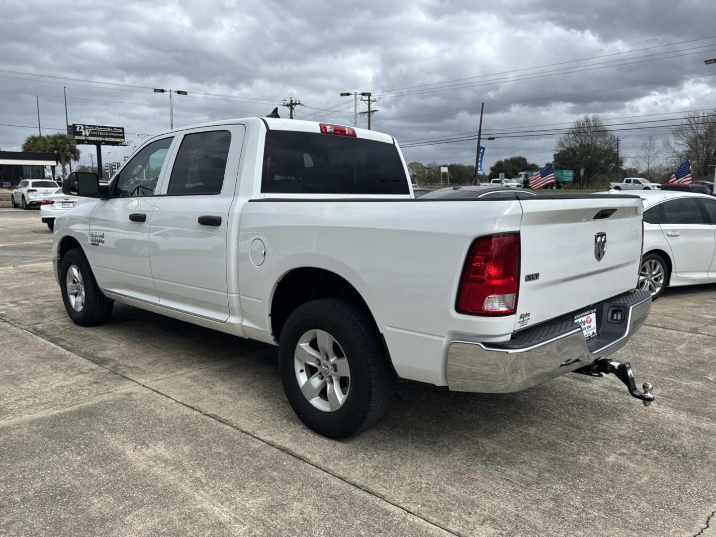2023 Bright White Clearcoat /Diesel Gray/Black Ram 1500 Classic SLT 4x2 Crew Cab 5'7 Box (1C6RR6LG2PS) , Automatic transmission, located at 6904 Johnston St., Lafayette, LA, 70503, (337) 988-1960, 30.143589, -92.100601 - Photo#4