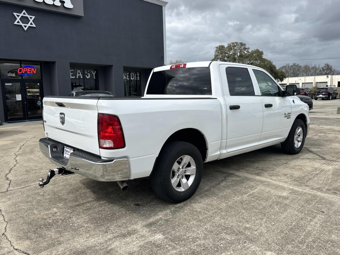 2023 Bright White Clearcoat /Diesel Gray/Black Ram 1500 Classic SLT 4x2 Crew Cab 5'7 Box (1C6RR6LG2PS) , Automatic transmission, located at 6904 Johnston St., Lafayette, LA, 70503, (337) 988-1960, 30.143589, -92.100601 - Photo#6