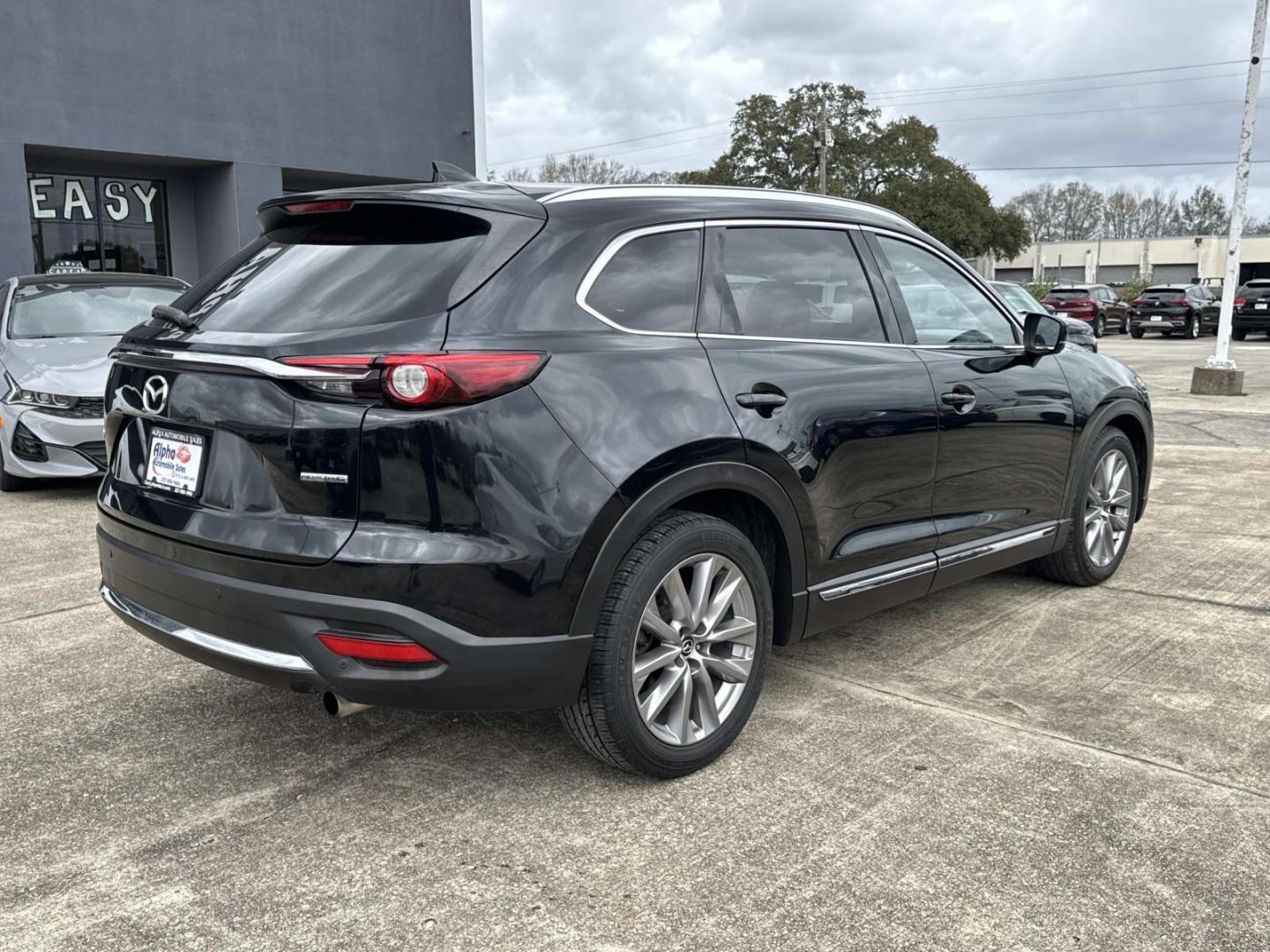 2021 Black /Black Mazda CX-9 Grand Touring FWD (JM3TCADY7M0) , Automatic transmission, located at 6904 Johnston St., Lafayette, LA, 70503, (337) 988-1960, 30.143589, -92.100601 - Photo#6