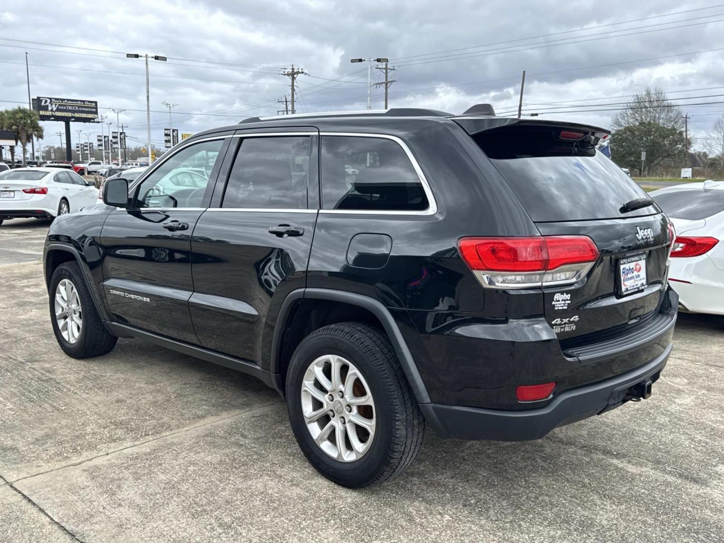 2014 Black /Black Jeep Grand Cherokee 4WD 4dr Laredo (1C4RJFAG3EC) , Automatic transmission, located at 6904 Johnston St., Lafayette, LA, 70503, (337) 988-1960, 30.143589, -92.100601 - Photo#4
